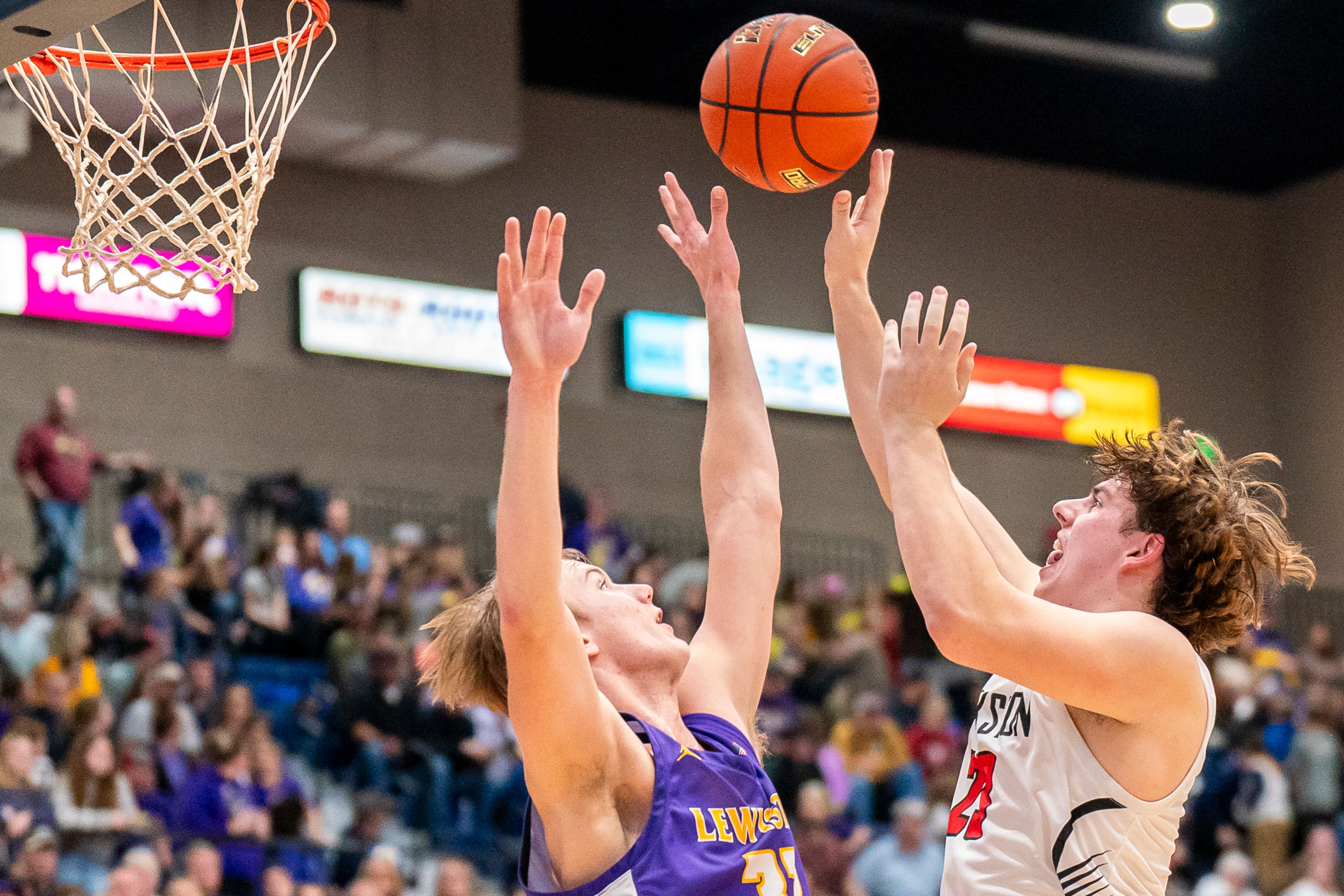 Clarkston’s Josh Hoffman, right, shoots the ball during their Golden Throne rivalry game against Lewiston on Friday inside the P1FCU Activity Center in Lewiston.