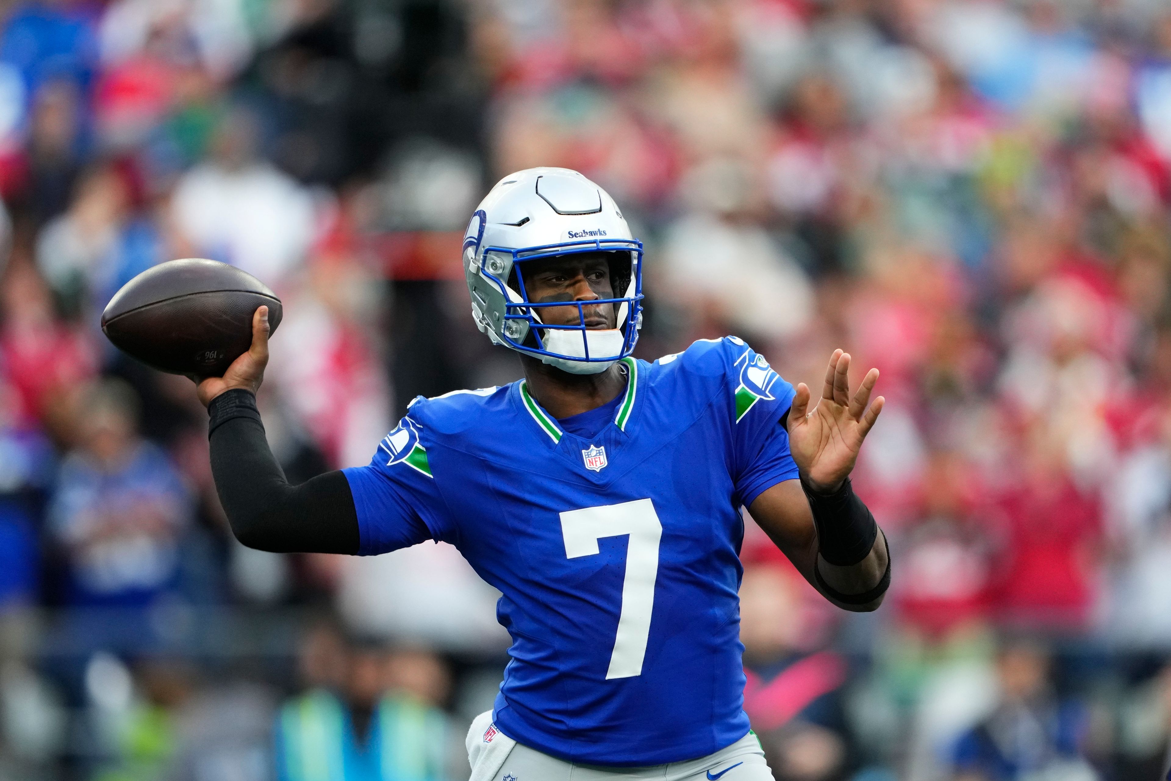 Seattle Seahawks quarterback Geno Smith throws during the first half of an NFL football game against the San Francisco 49ers, Thursday, Oct. 10, 2024, in Seattle. (AP Photo/Lindsey Wasson)