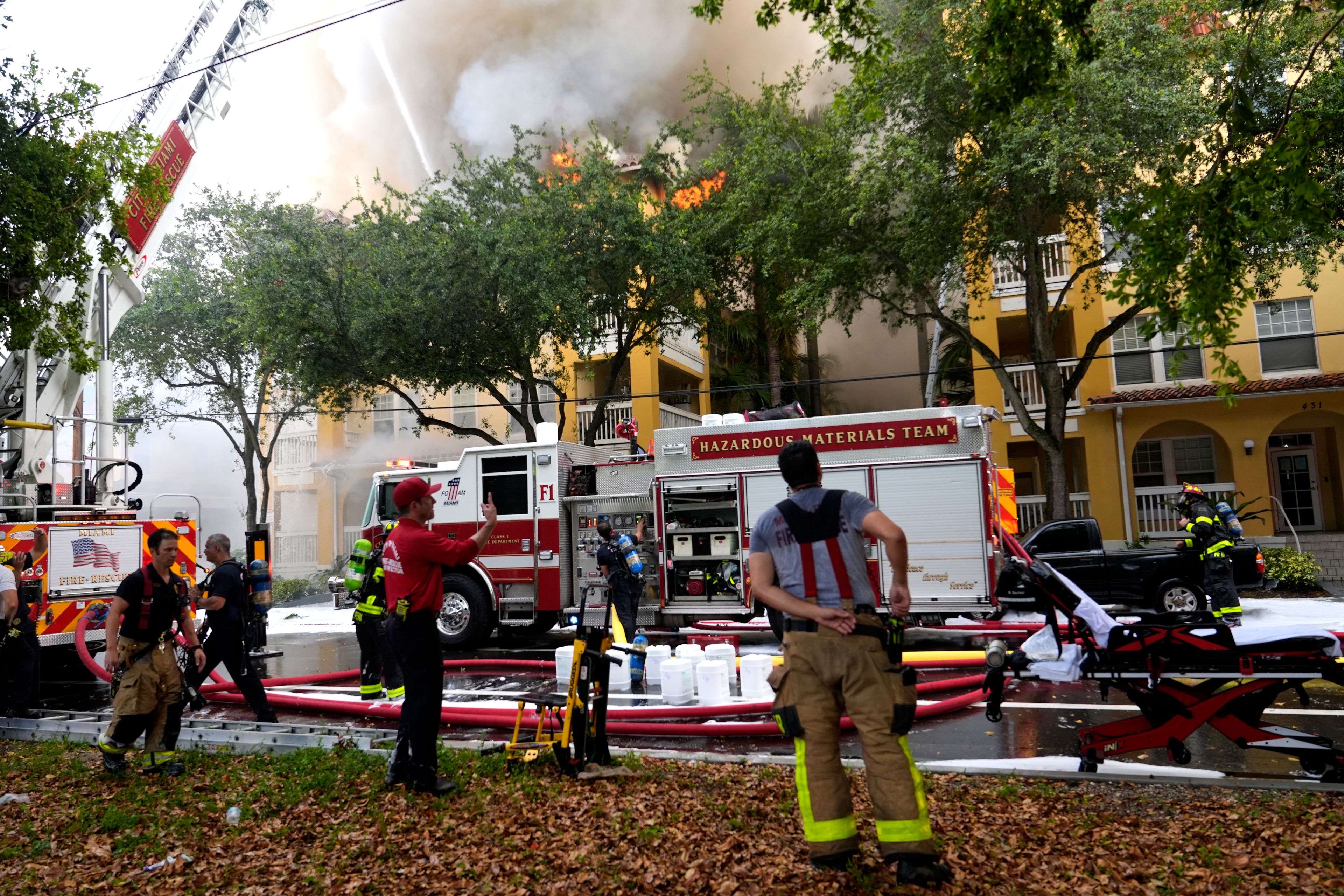 City of Miami Fire Rescue firefighters work at the scene of a fire at the Temple Court apartments Monday, June 10, 2024, in Miami.