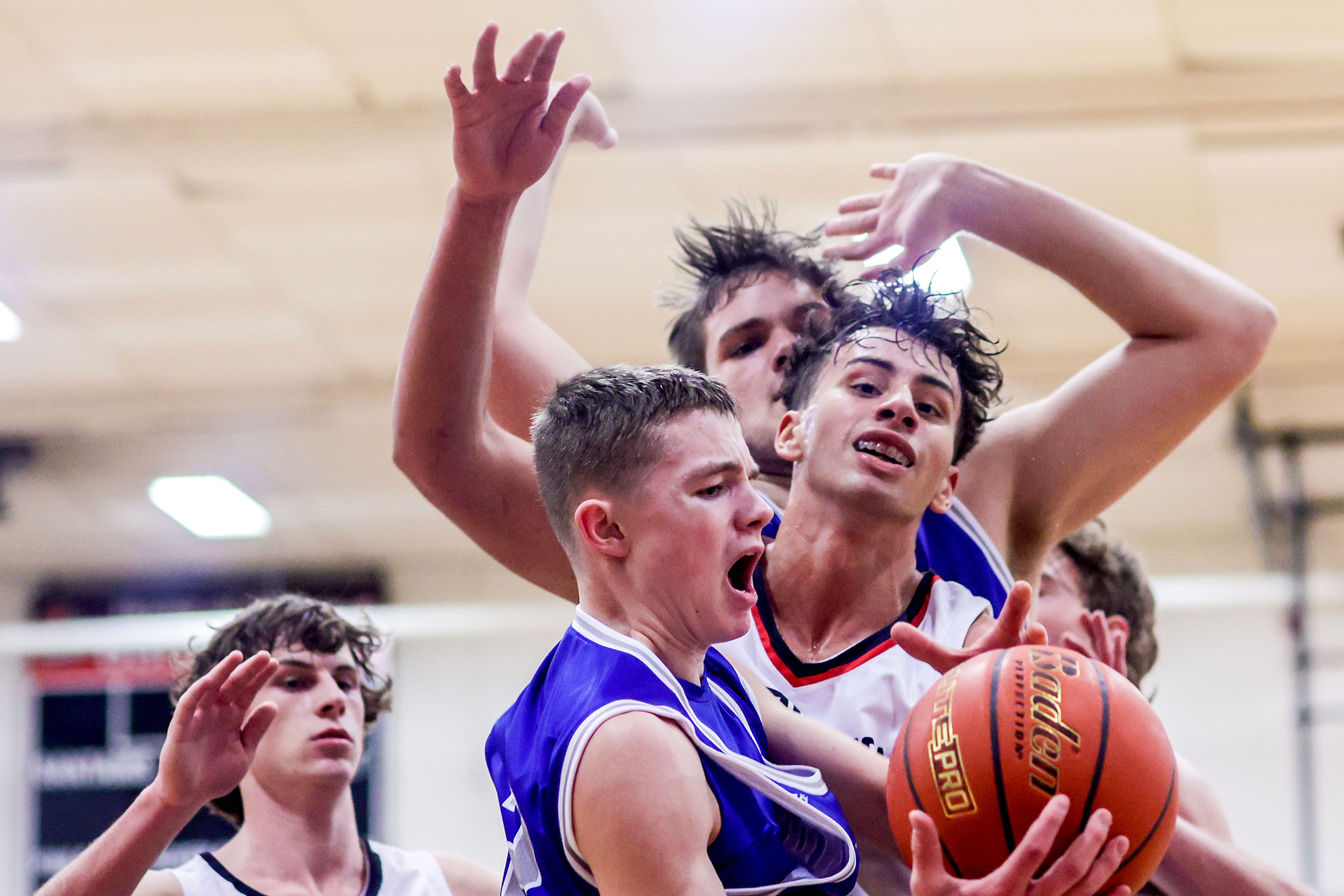 Pullman point guard Jaedyn Brown grabs a rebound during Tuesday's Class 2A Greater Spokane League boys basketball game.