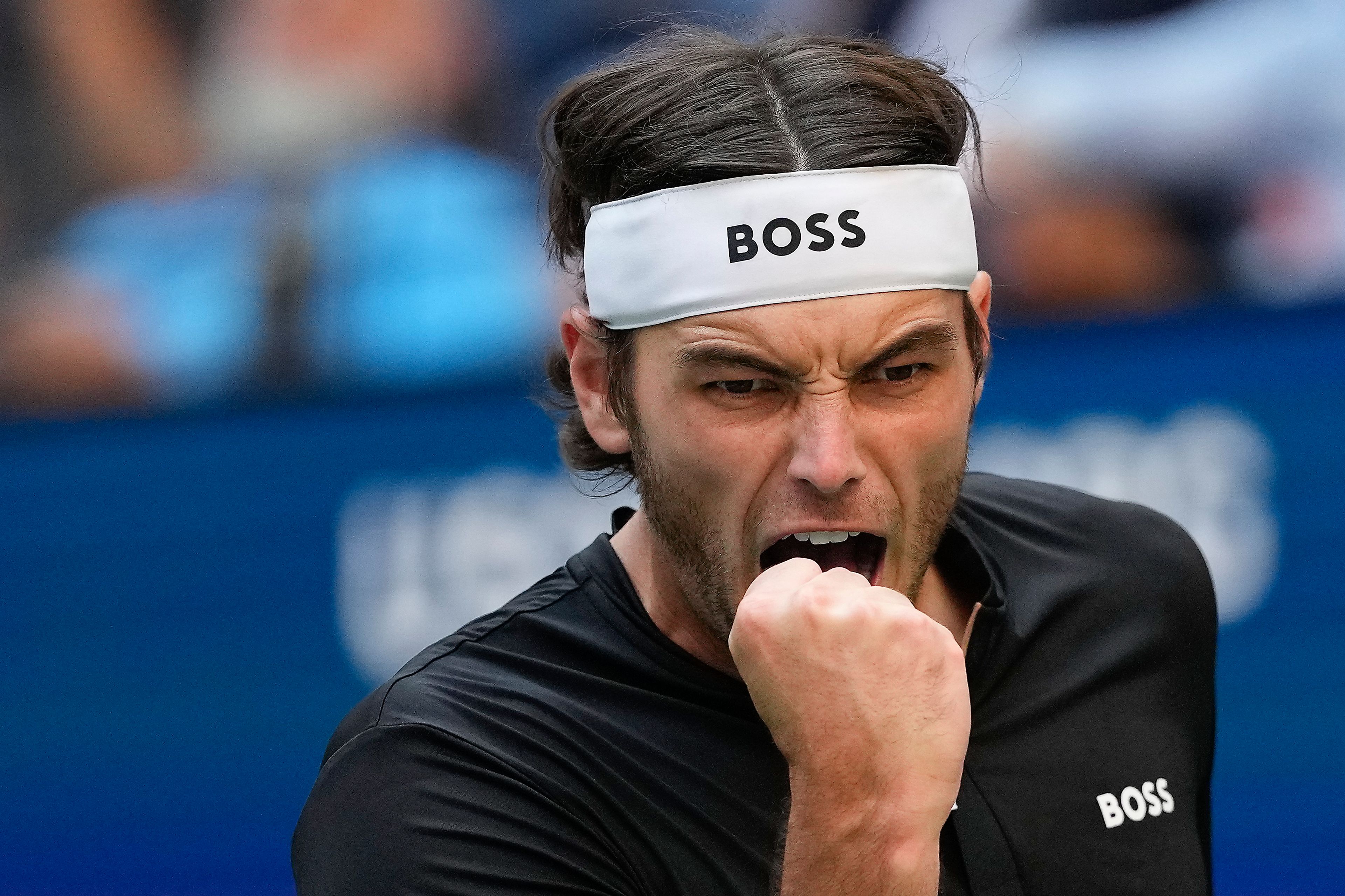 Taylor Fritz, of the United States, reacts after scoring a point against Alexander Zverev, of Germany, during the quarterfinals of the U.S. Open tennis championships, Tuesday, Sept. 3, 2024, in New York.