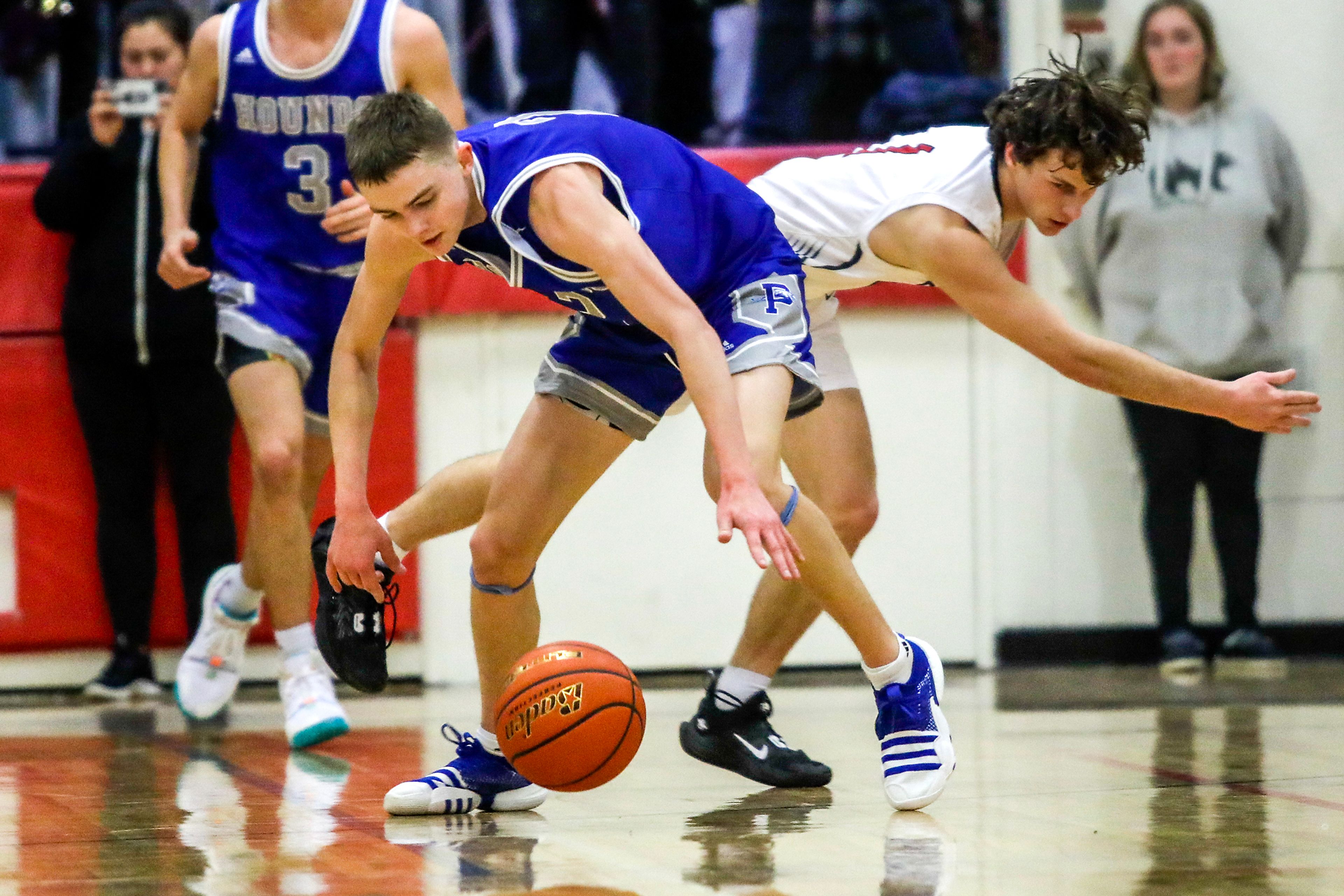 Pullman point guard Jaedyn Brown steals the ball away from Clarkston guard Landon Taylor during Tuesday’s Class 2A Greater Spokane League boys basketball game.