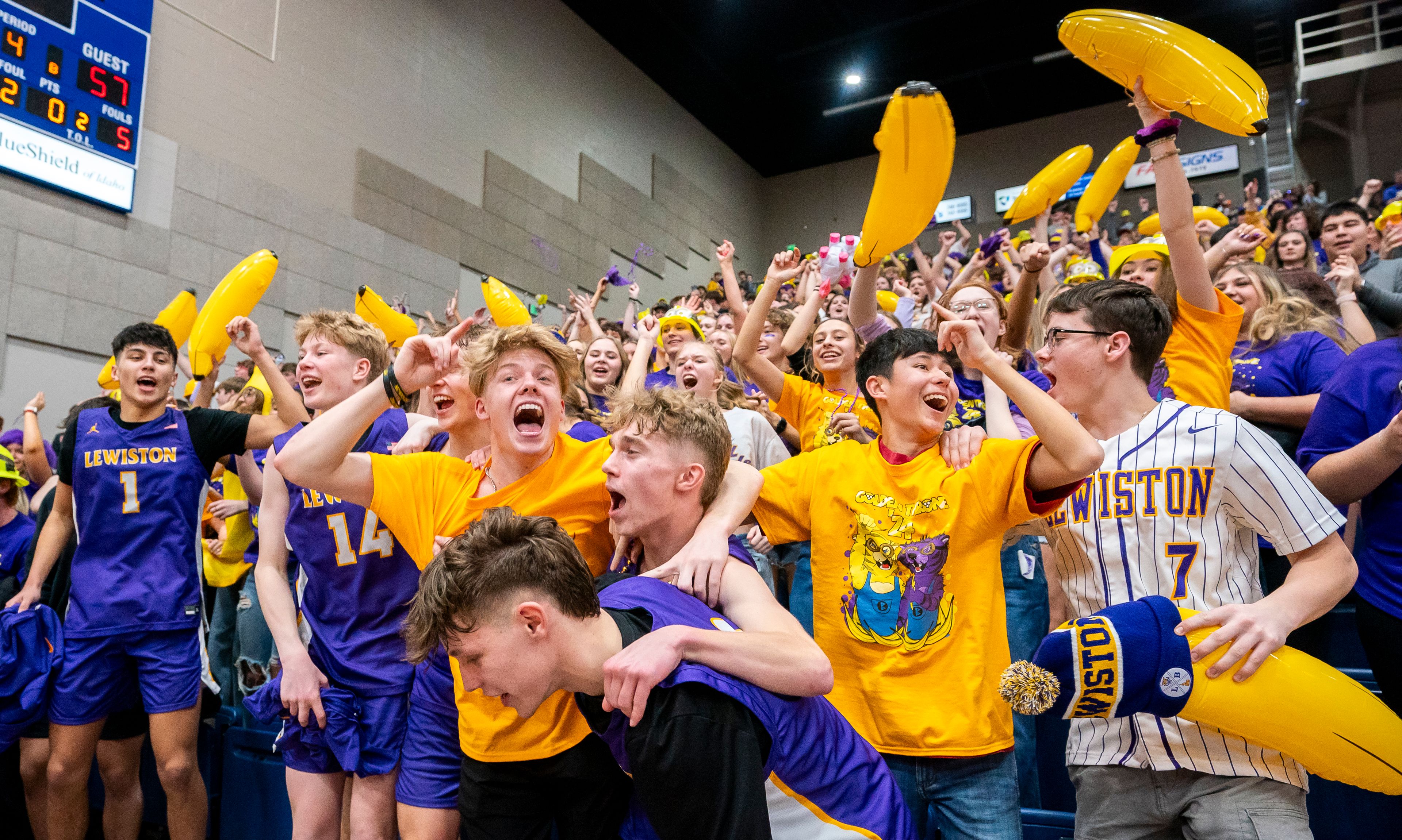 The Lewiston High School student section celebrates after winning the Golden Throne on Friday inside the P1FCU Activity Center in Lewiston.