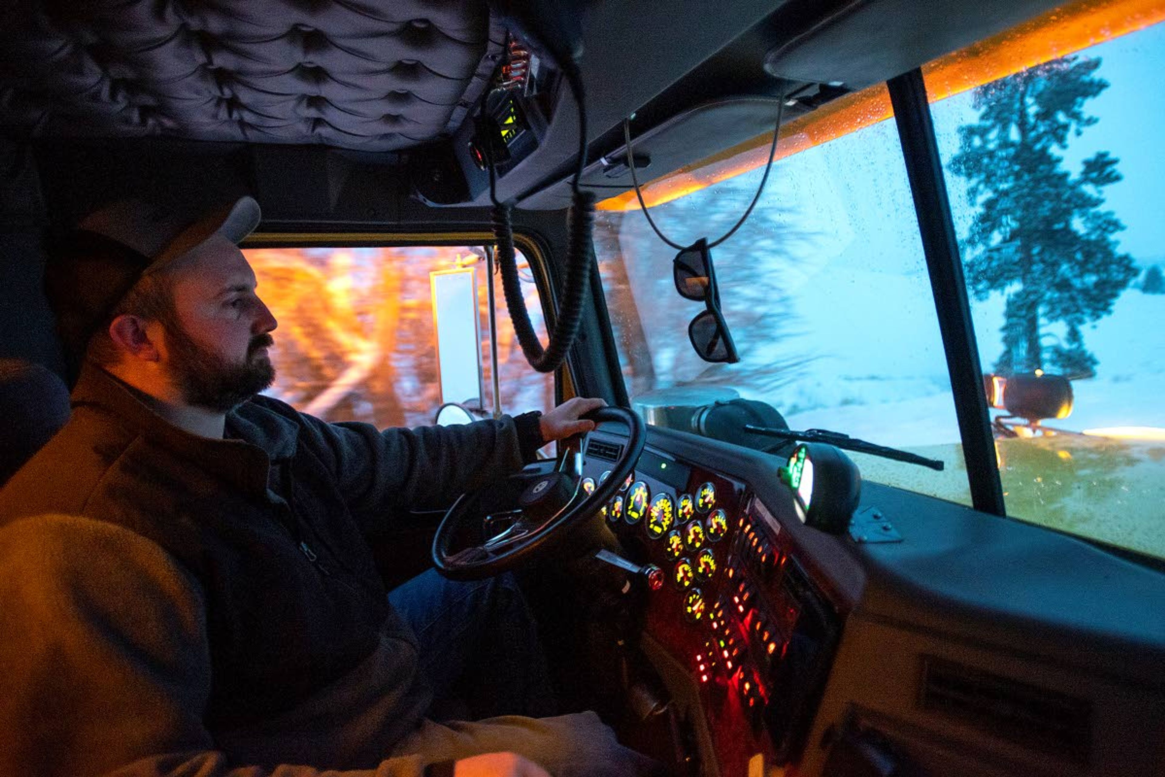 Snow whips across the windshield of a snowplow as Cody Bailey, 33, clears Baumgartner Road northeast of Genesee on Wednesday morning.