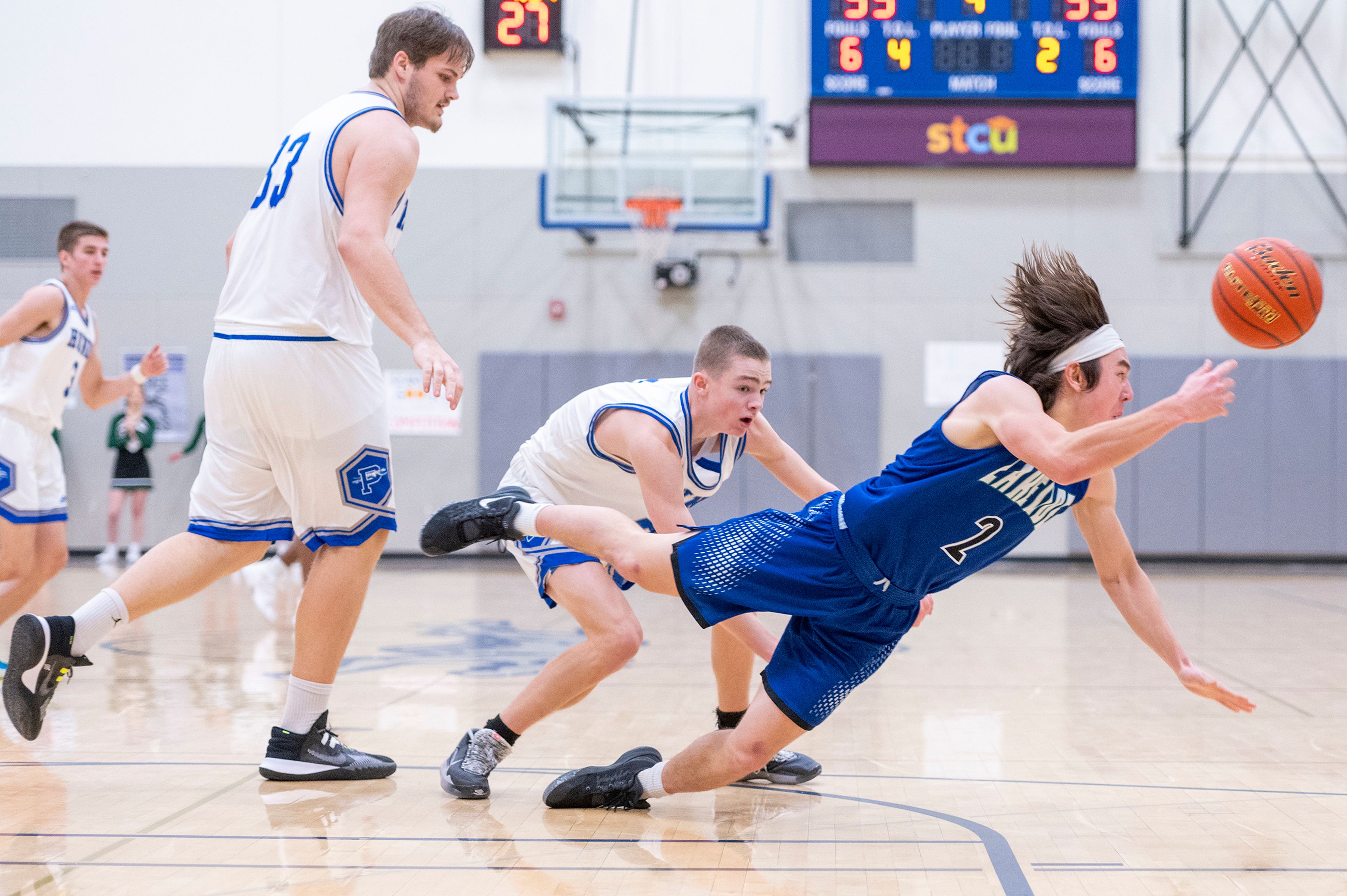 Pullman guard Jaedyn Brown, center, forces Lakeside guard Sadahiro Patterson to turn the ball over during Friday's nonleague game.