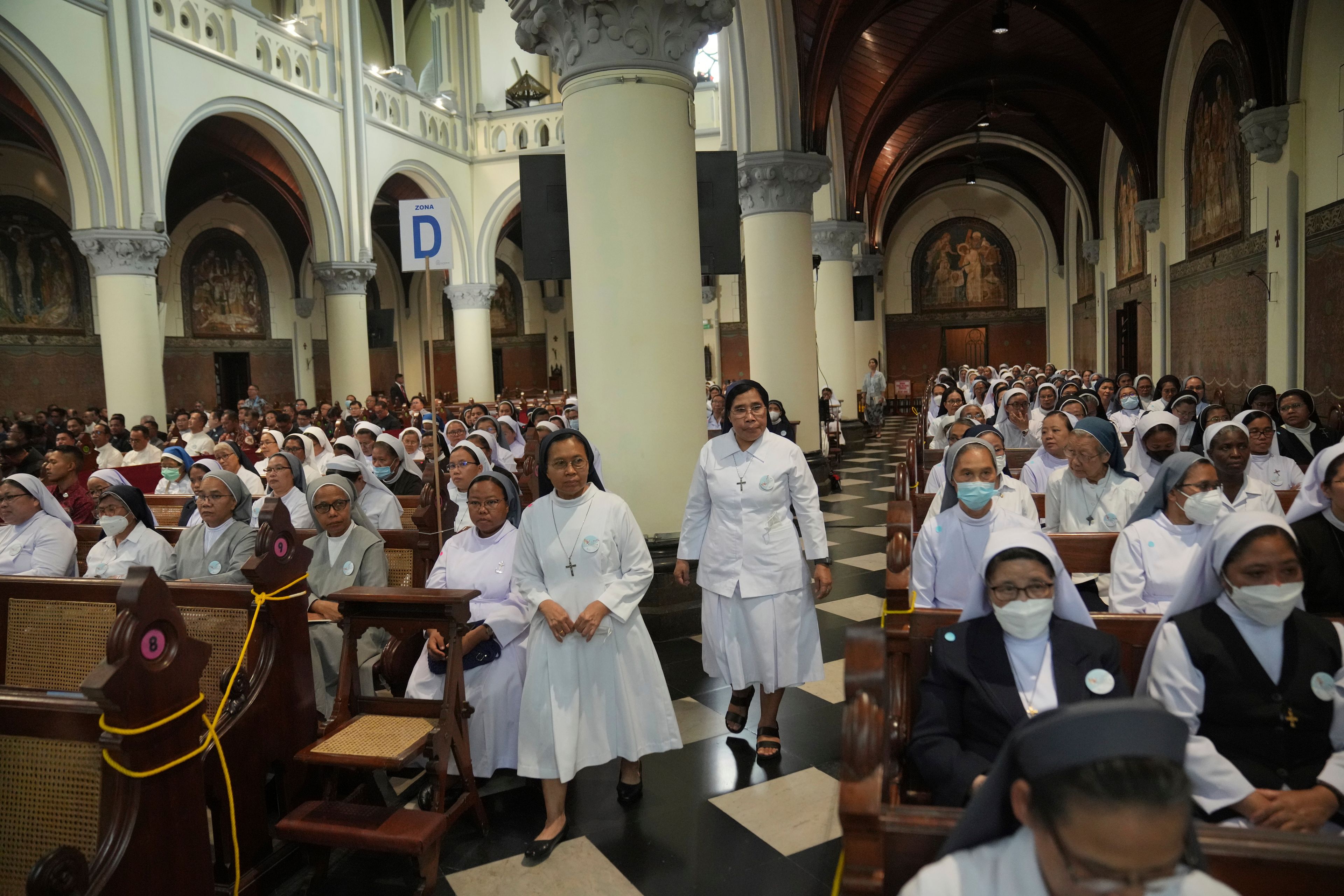 Nuns arrive for a meeting with Pope Francis in the Cathedral of Our Lady of the Assumption, the capital's main Catholic cathedral, in Jakarta, Indonesia, Wednesday, Sept. 4, 2024.