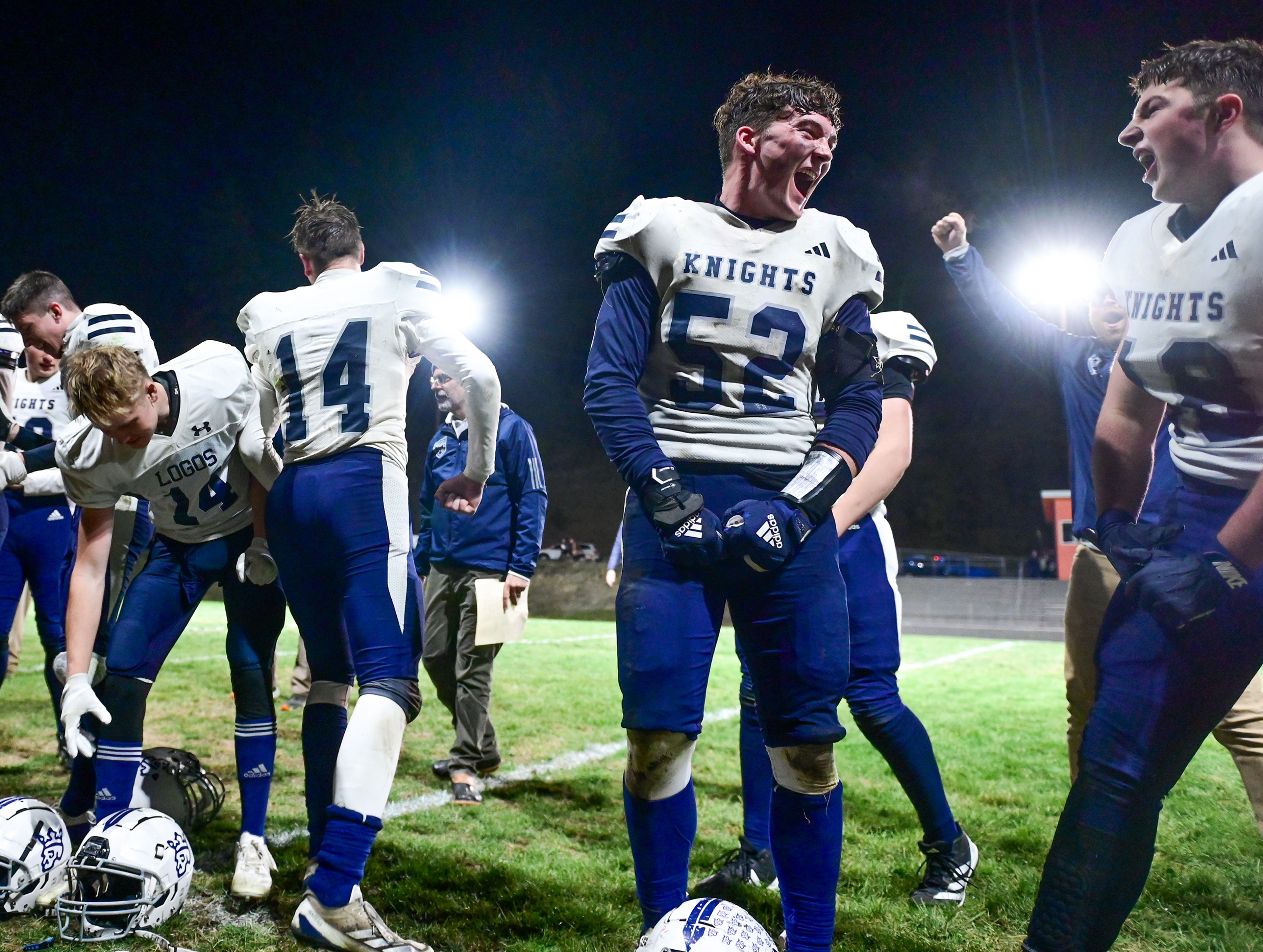 Logos players celebrate their win over Kendrick Friday in Kendrick.,