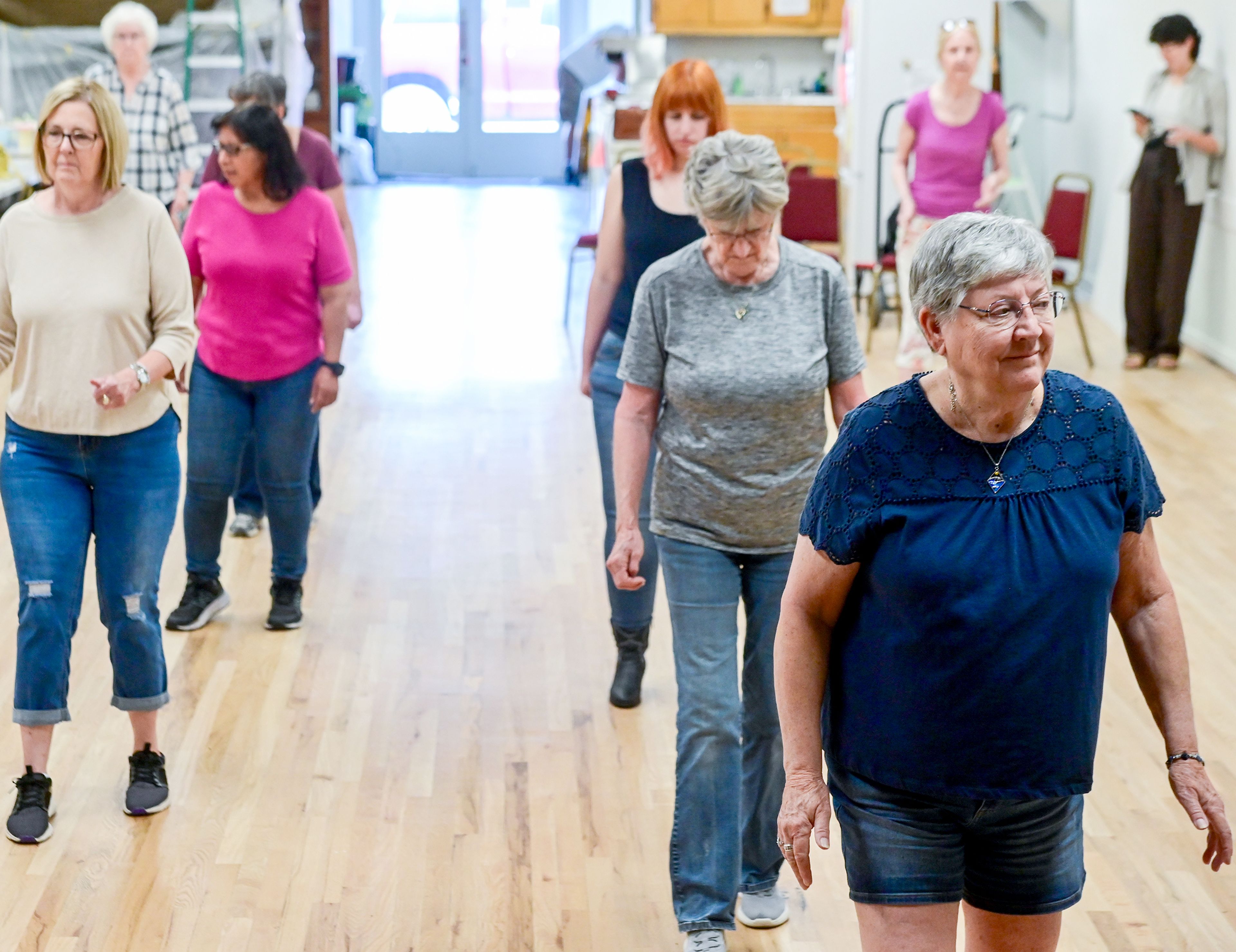 Line dancers fill the floor of the Sixth Street Senior Center, a weekly event at the center in Clarkston.