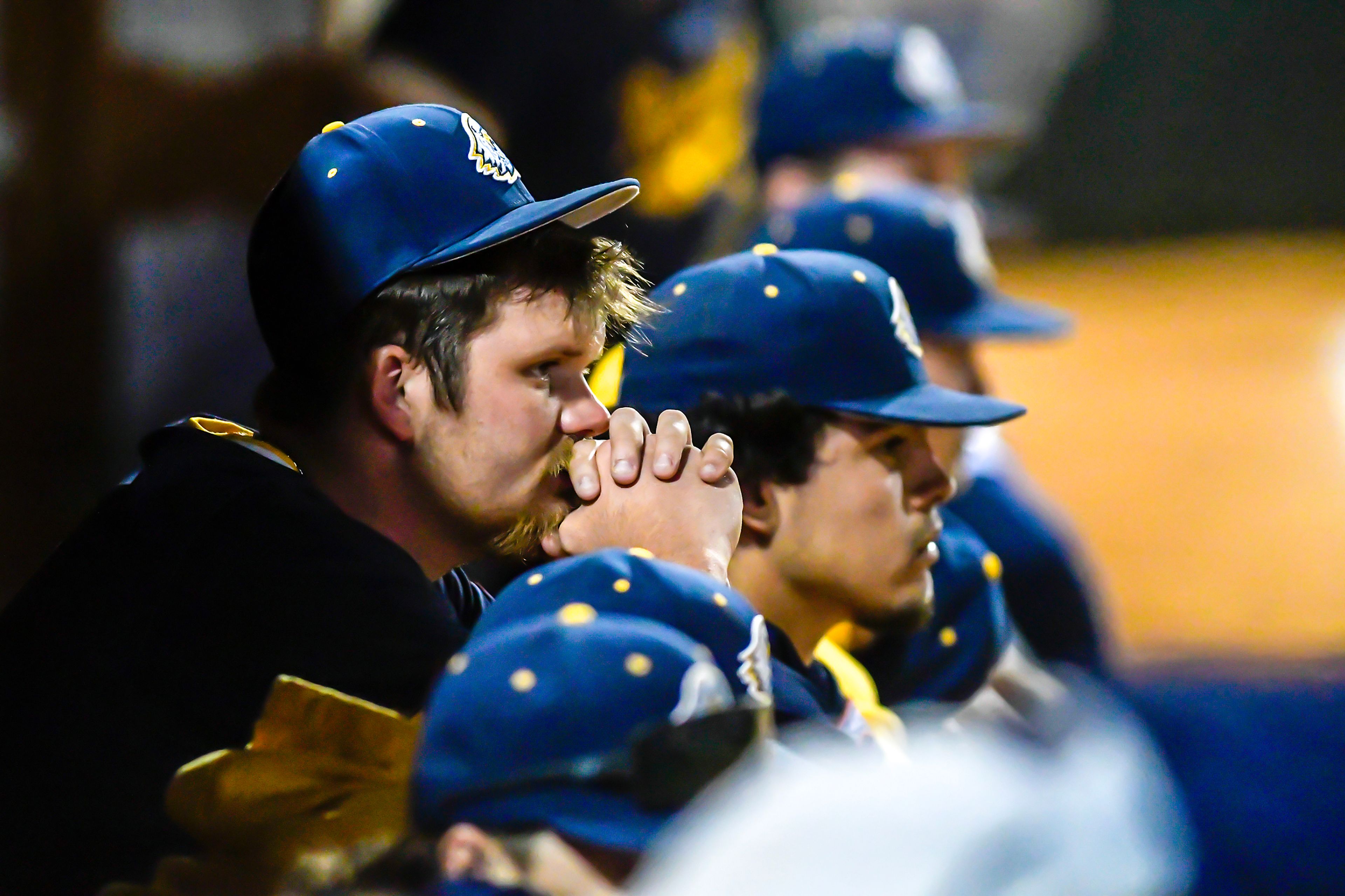 Reinhardt players watch Tennessee Wesleyan celebrate their victory in Game 18 of the NAIA World Series at Harris Field Thursday in Lewiston.