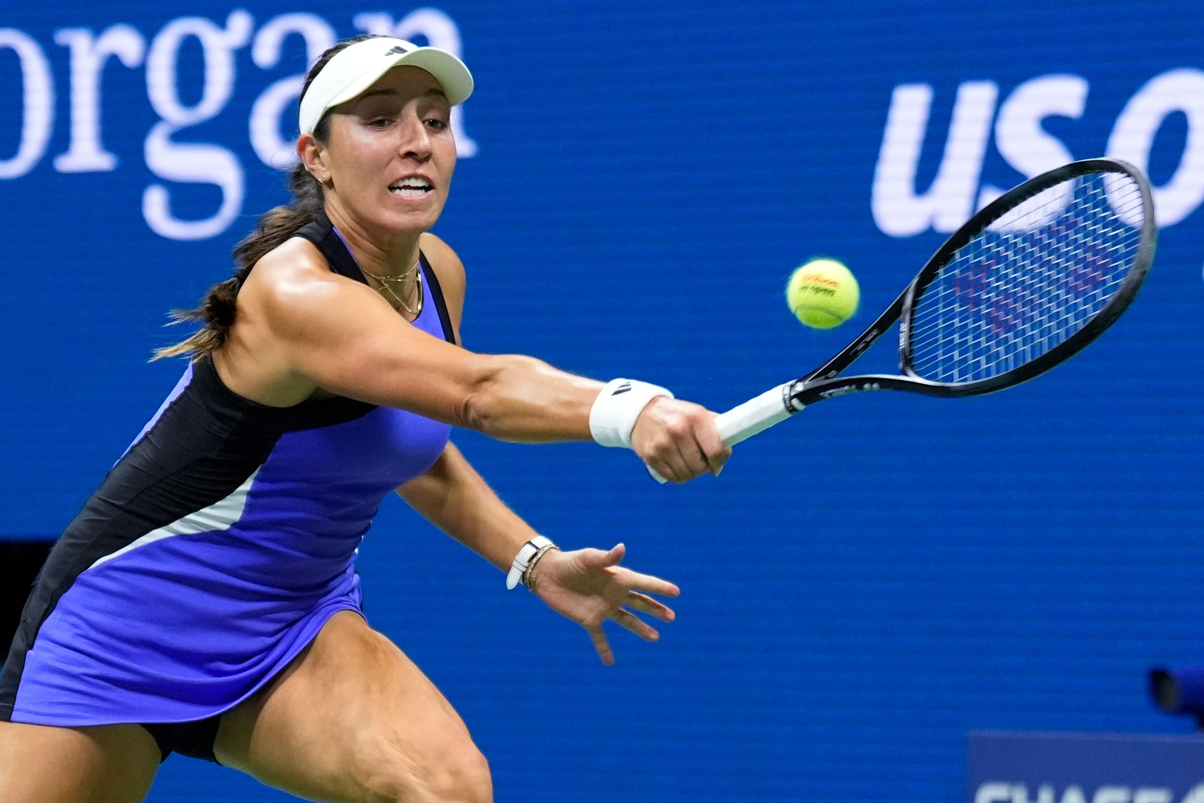 Jessica Pegula, of the United States, stretches for a return against Iga Świątek, of Poland, during the quarterfinals of the U.S. Open tennis championships, Wednesday, Sept. 4, 2024, in New York.