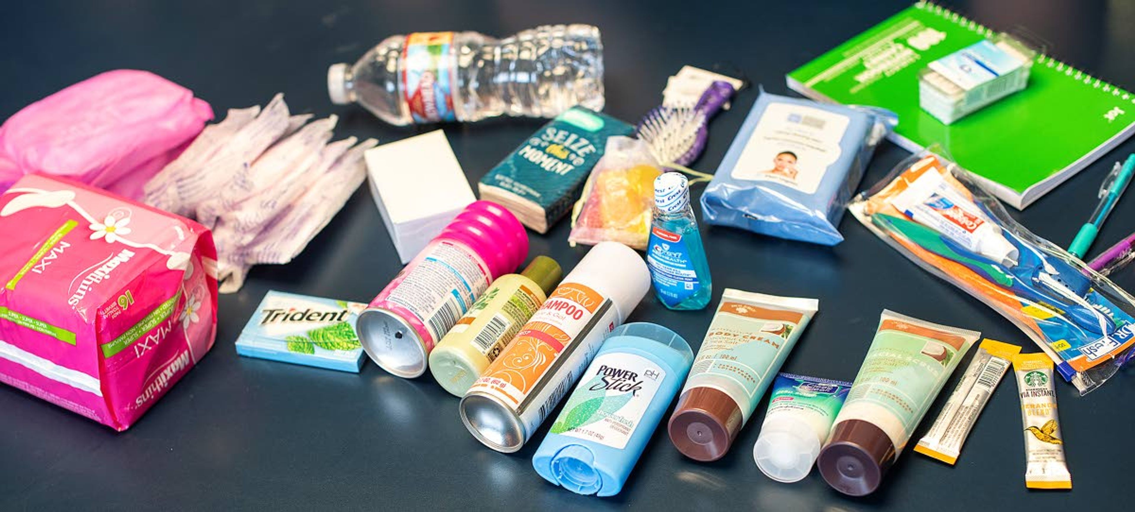 Contents of one of the care boxes the couple put together features a number of various toiletries, a water bottle and other items.