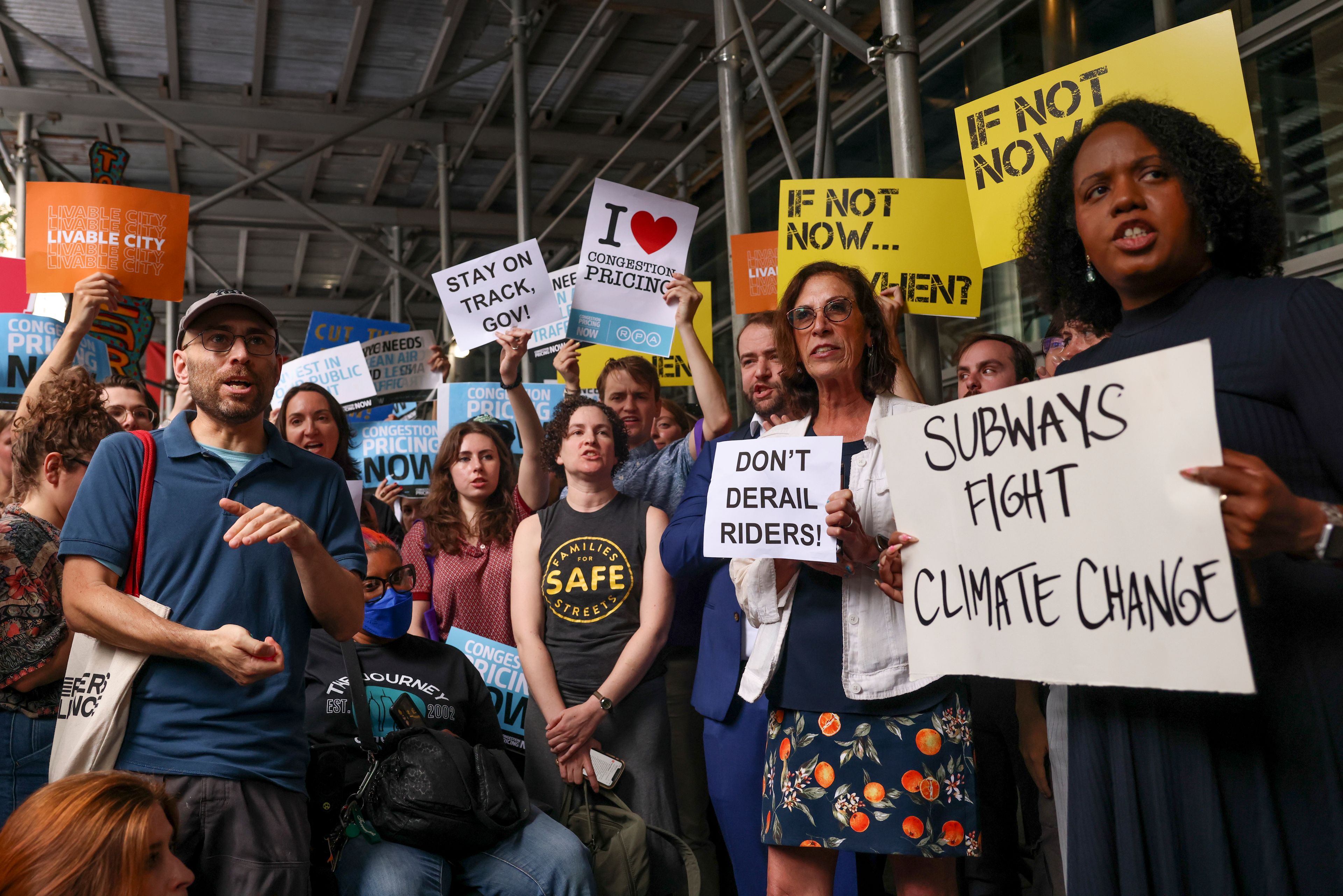 Protesters demonstrate outside New York Gov. Kathy Hochul's Manhattan office, Wednesday, June 5, 2024, in New York. Hochul is indefinitely delaying implementation of a plan to charge motorists big tolls to enter the core of Manhattan, just weeks before the nation's first "congestion pricing" system was set to launch.