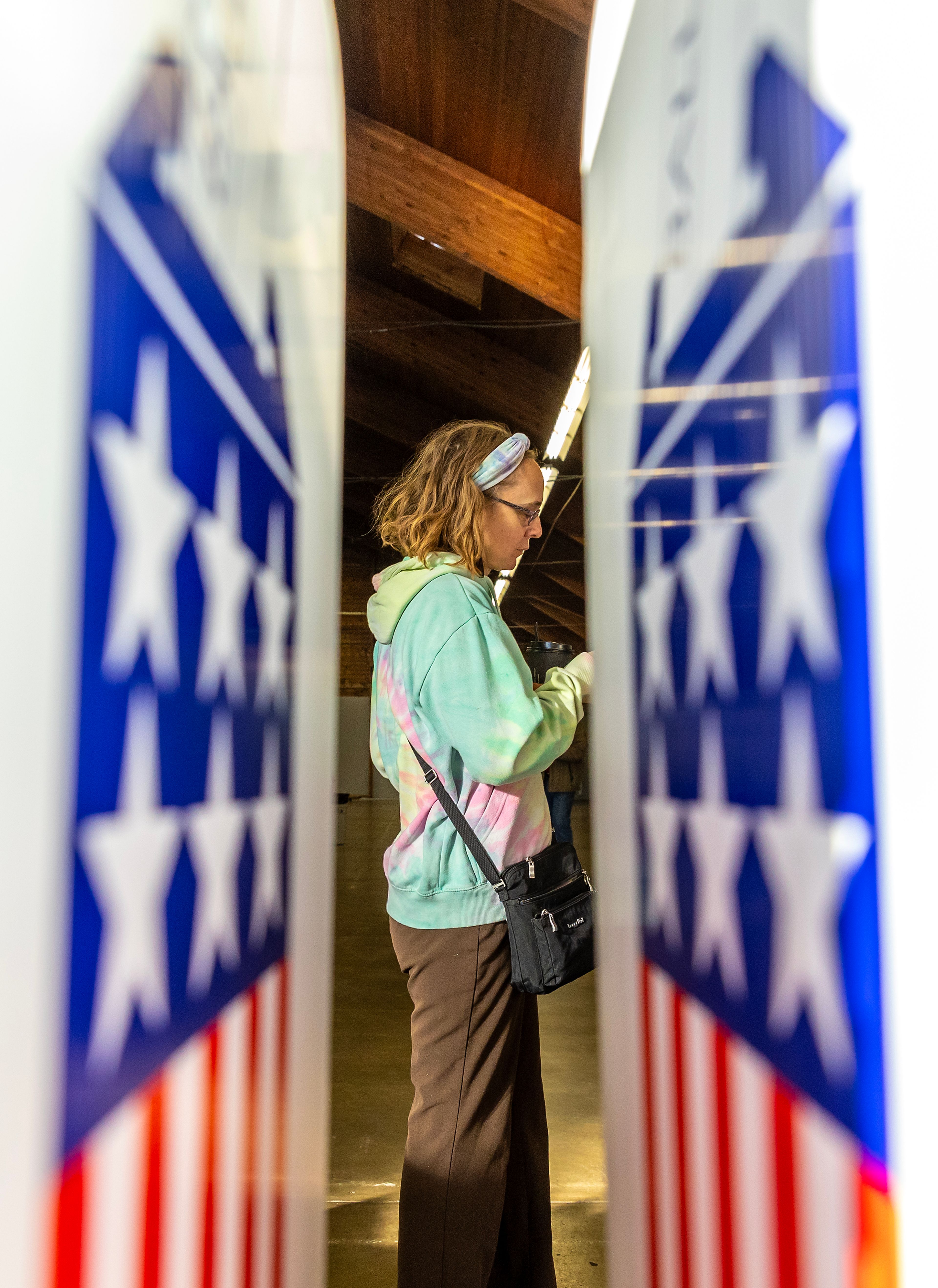 A voter waits in line to receiver a ballot Tuesday at the Nez Perce County Fairgrounds in Lewiston.