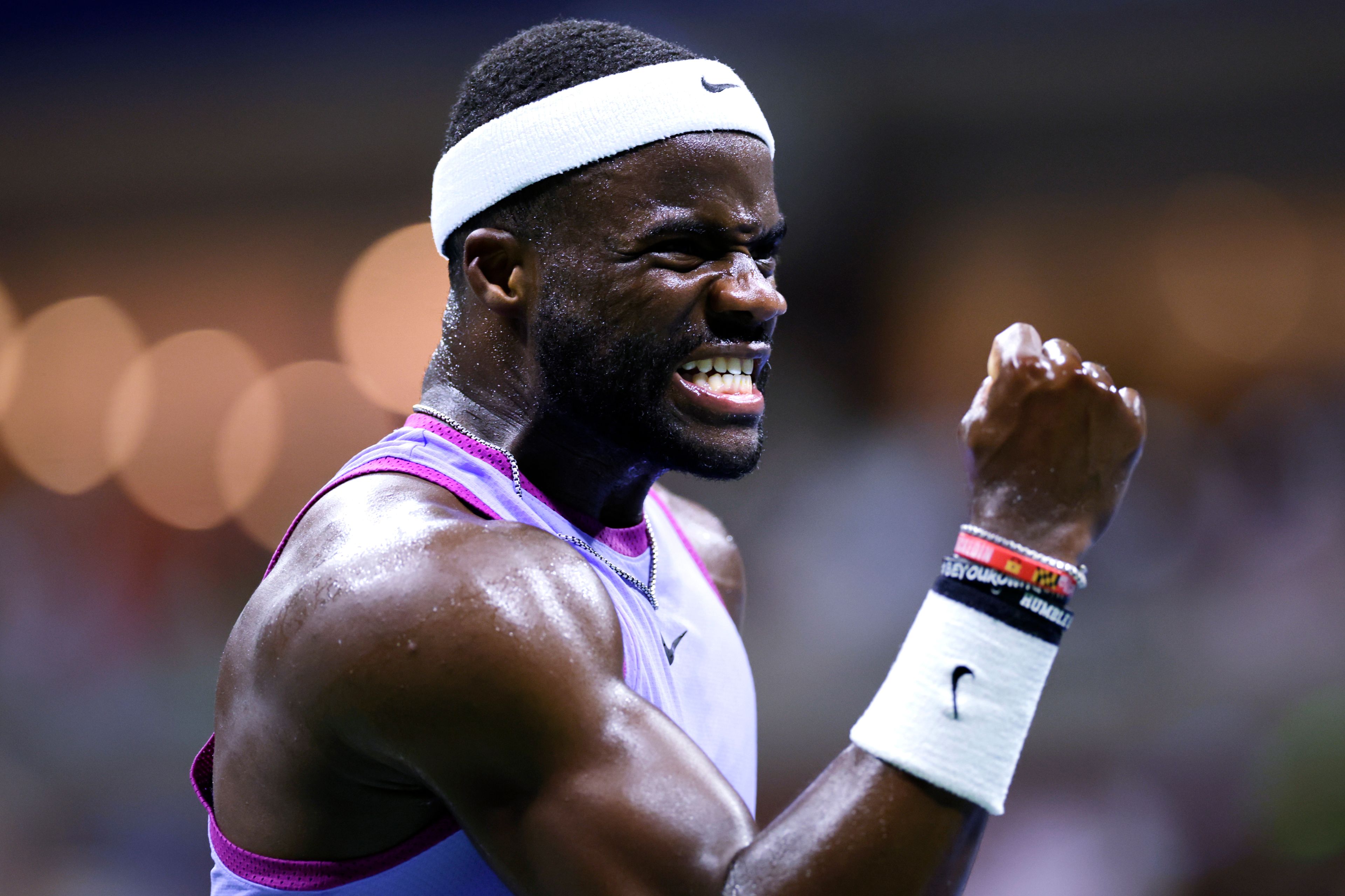 Frances Tiafoe, of the United States, celebrates after winning a point against Grigor Dimitrov, of Bulgaria, during the quarterfinals of the U.S. Open tennis championships, Tuesday, Sept. 3, 2024, in New York.