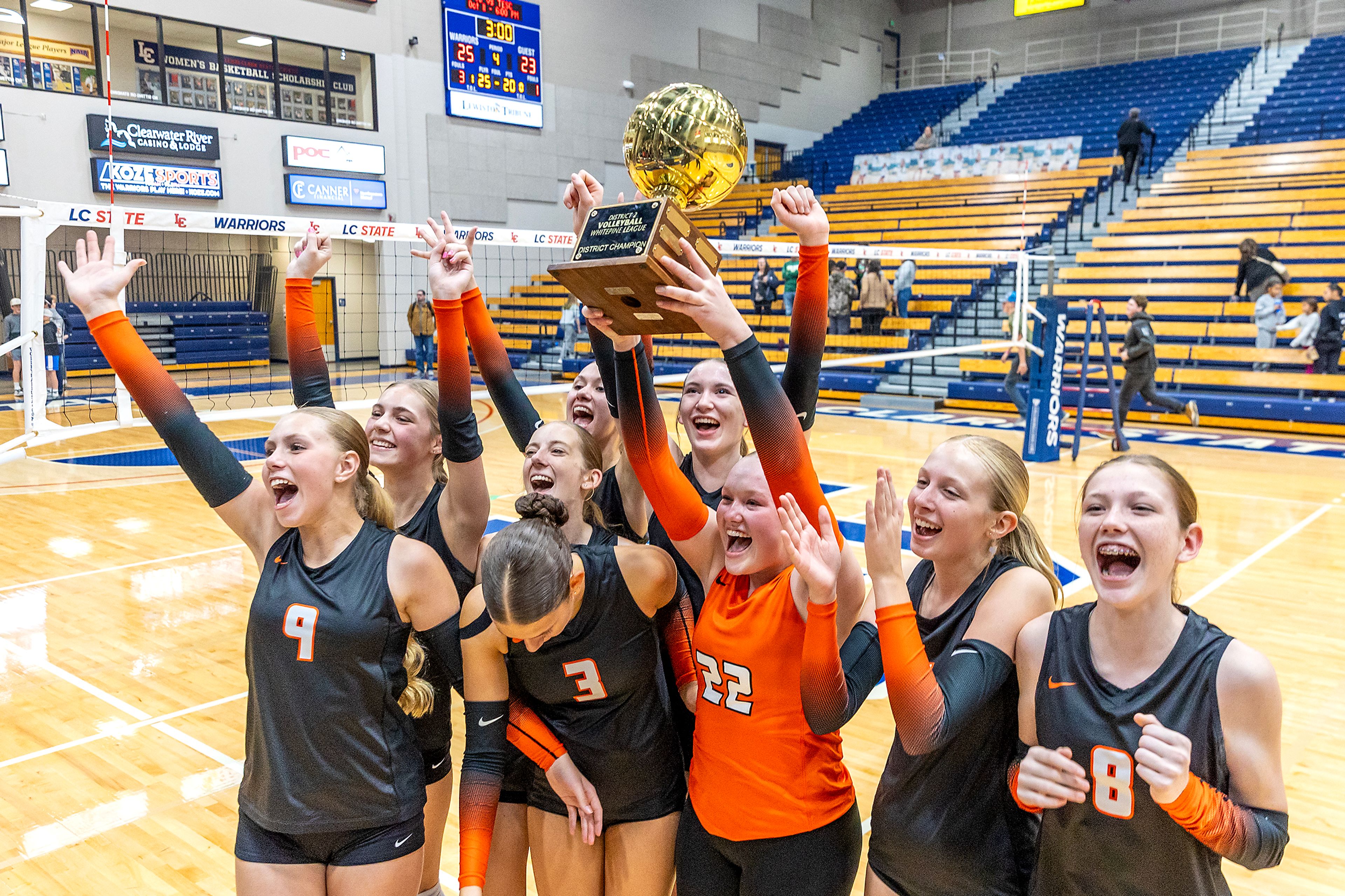 Troy celebrates defeating Potlatch in a 2A district championship Wednesday at the P1FCU Activity Center in Lewiston.