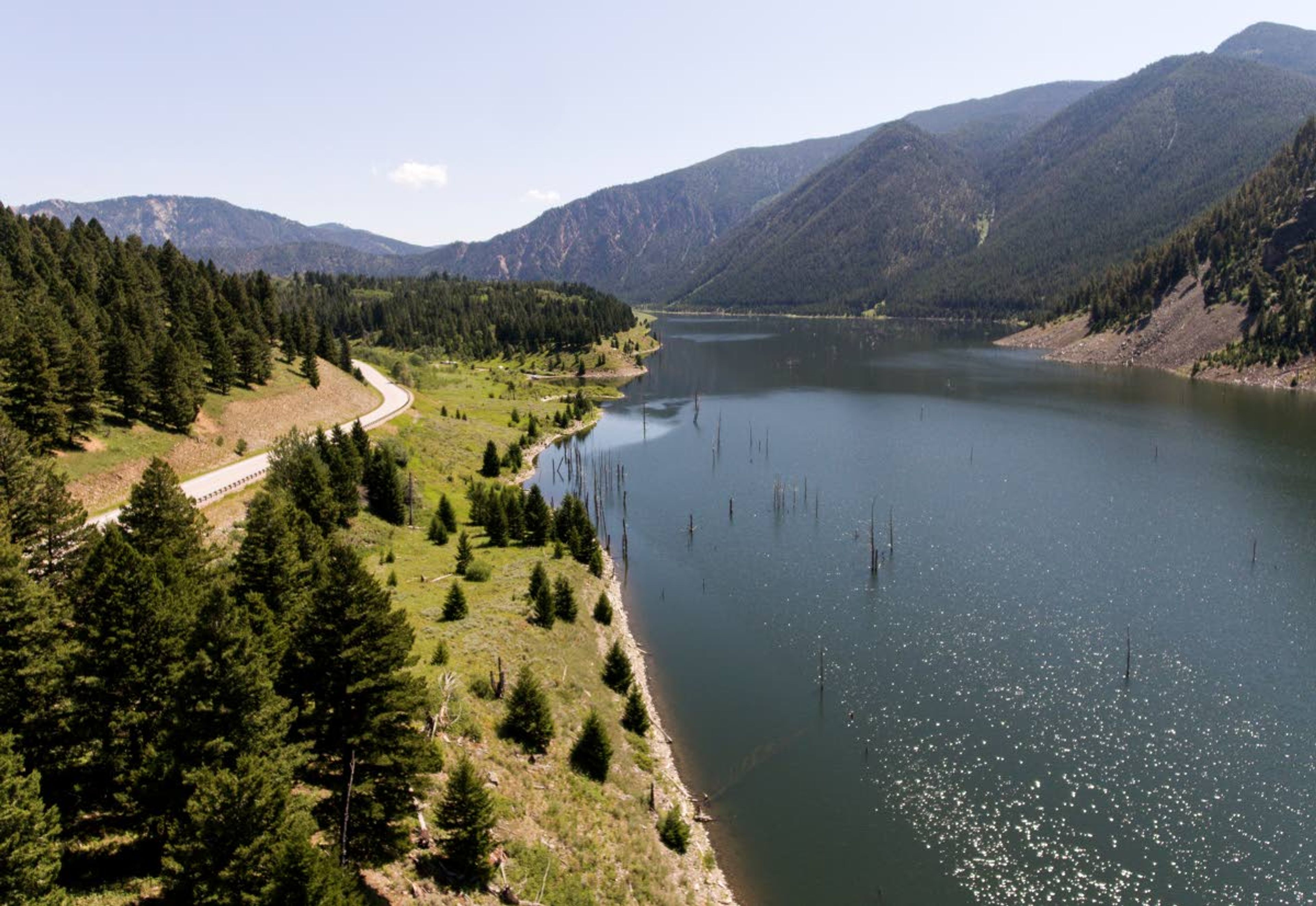 August 17th marks the 60th anniversary of the formation of Earthquake Lake. An earthquake had disrupted the full-moon night of Aug. 17, 1959, turning it chaotic and terrifying. The quake had a magnitude of 7.3, and it remains the largest to hit the region. The landslide also stopped the river. The water backed up and spread out, turning a swath of canyon into an ominous lake. (Rachel Leathe/Bozeman Daily Chronicle via AP)