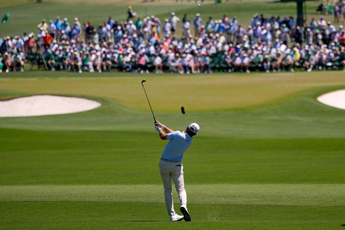 McIlroy stumbles at the Masters and now shares the lead with Young