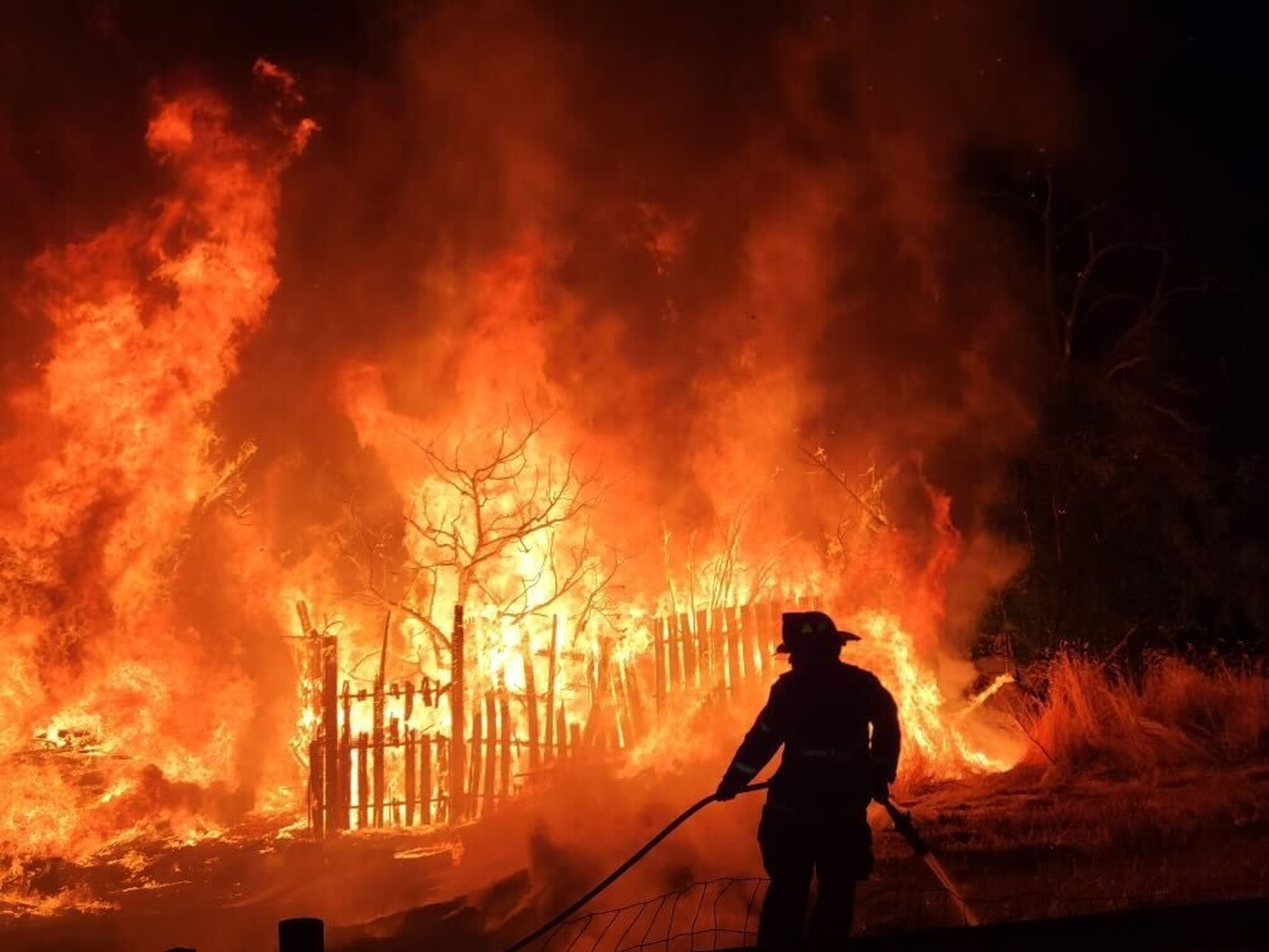 Fire crews battle a blaze Thursday on Poplar Street near 13th Street in Clarkston.