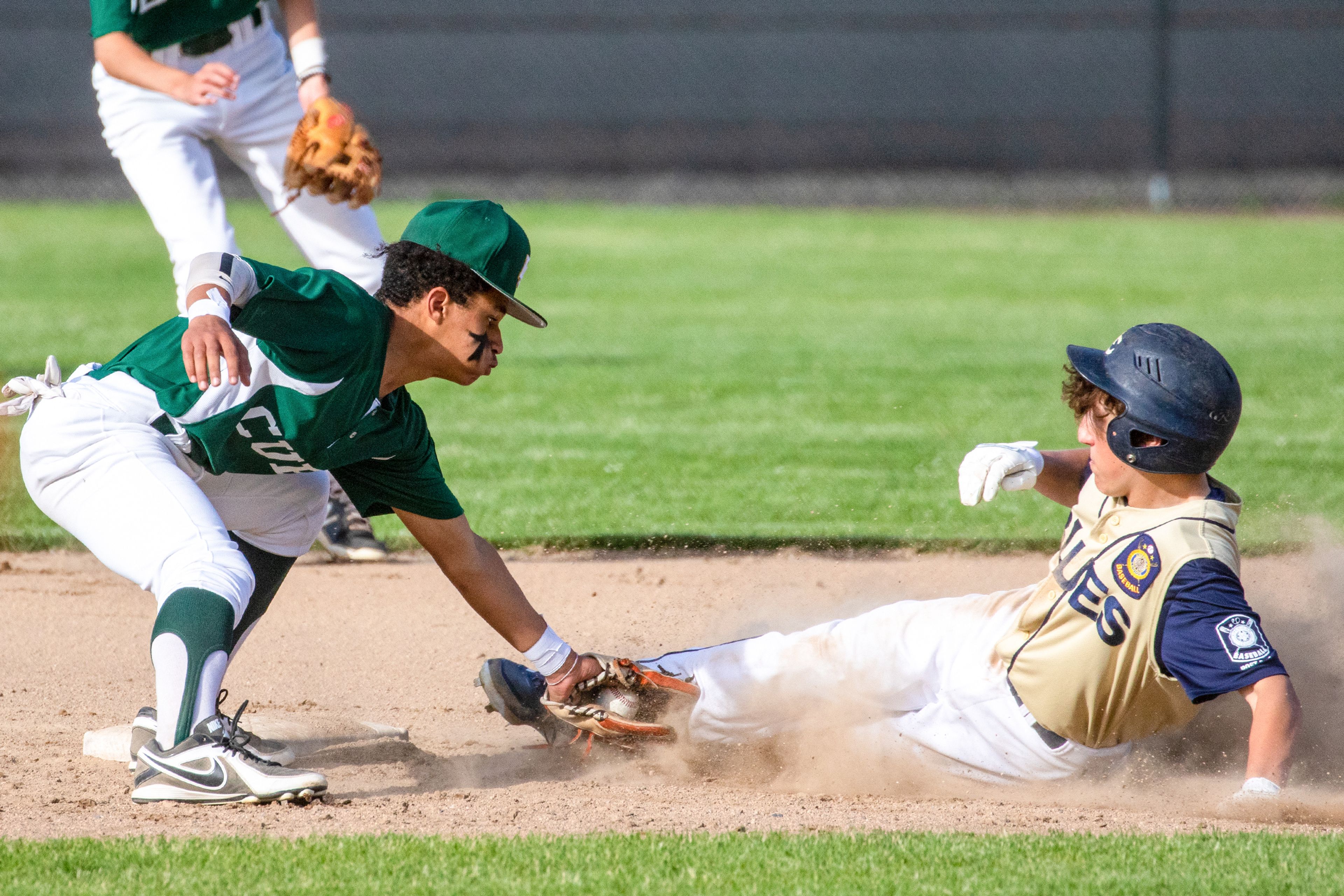 Lewis-Clark Cubs second baseman Austin Topp tags out the Asotin County Blues’ Noah Koehler during an American Legion baseball game Tuesday.