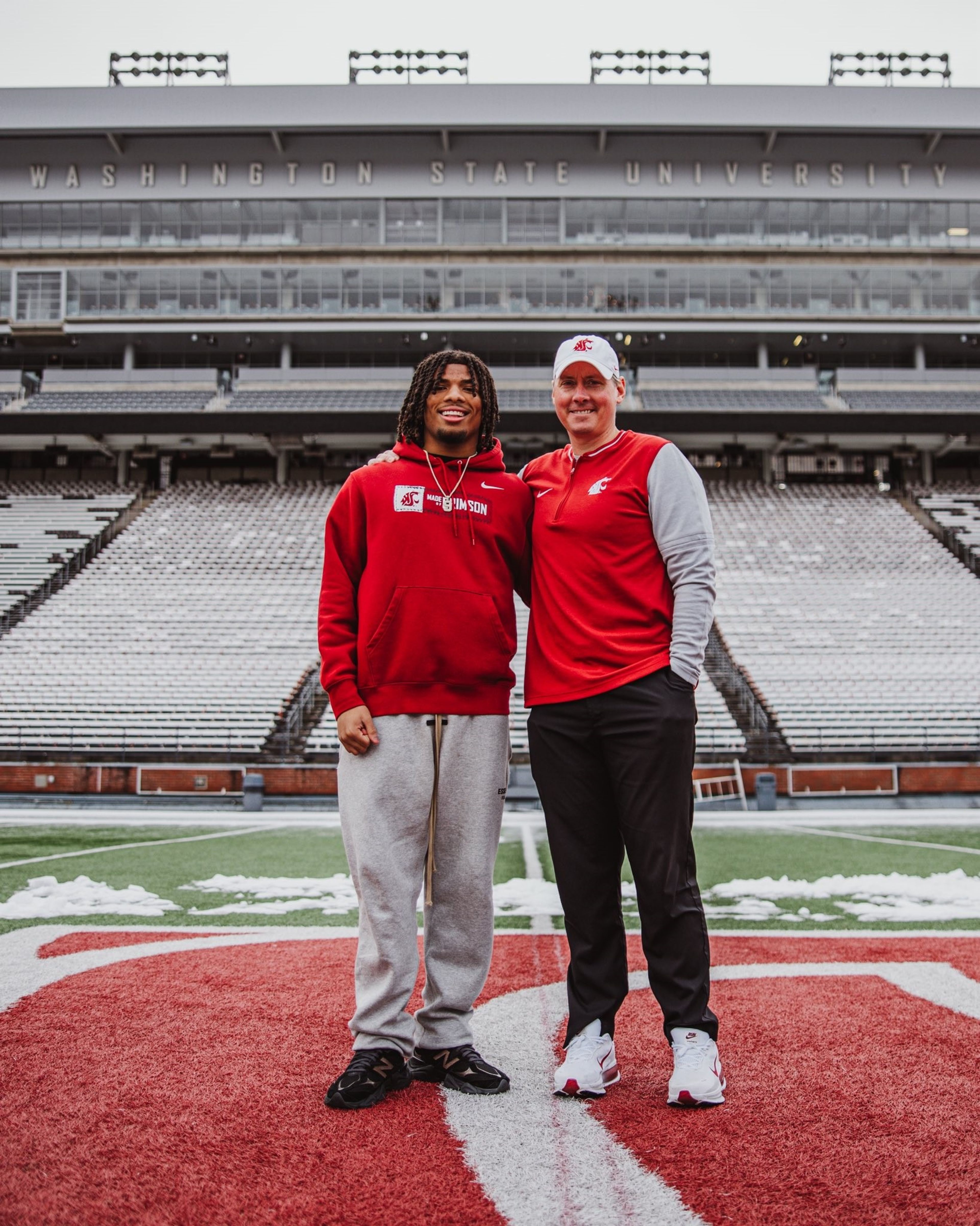 Washington State recruit Lance McGee, a three-star running back/linebacker from Sumner High School (Wash.) poses for a photo with WSU defensive coordinator Trent Bray in this undated photo at Gesa Field.

