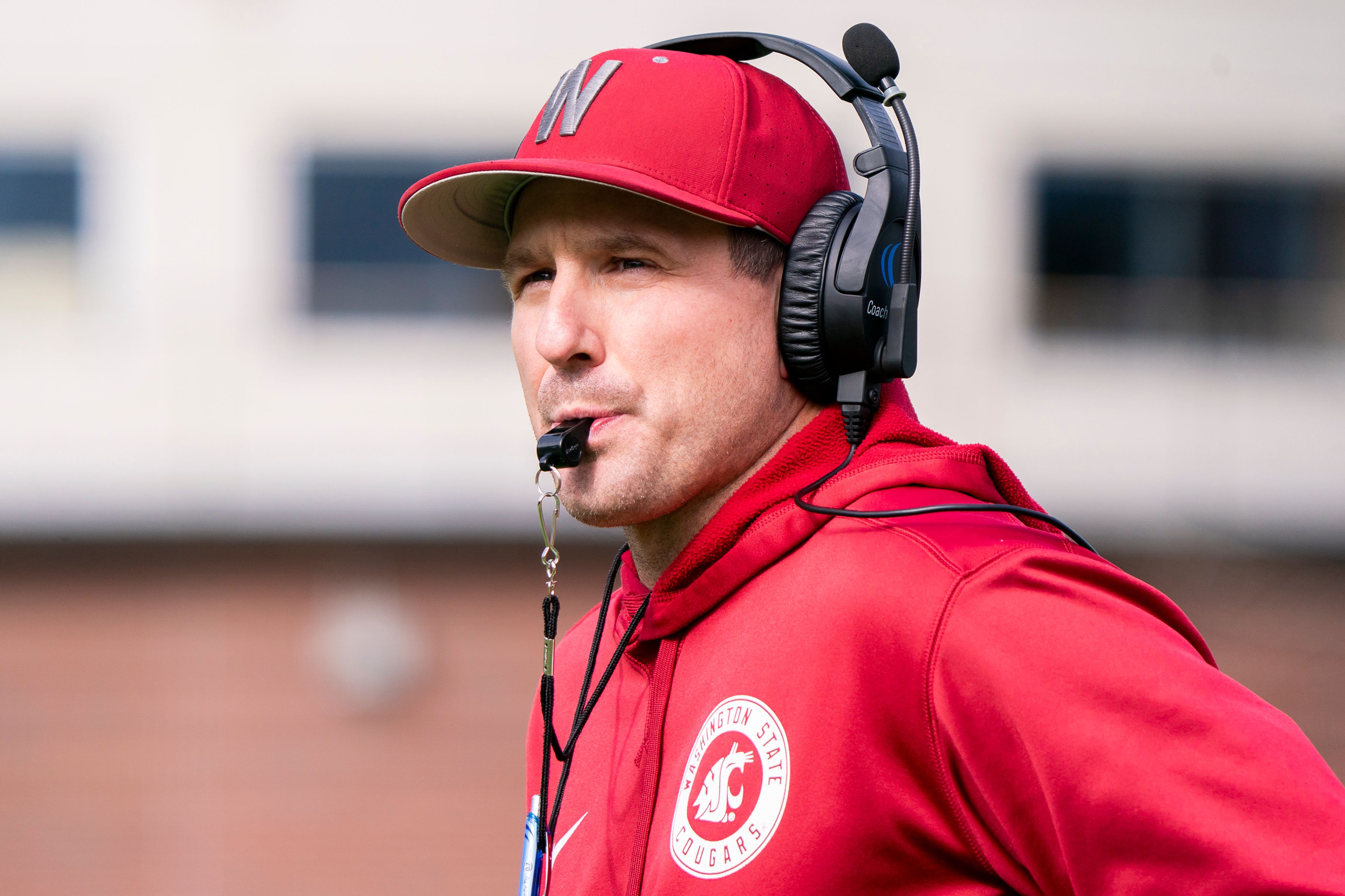 Washington State football head coach Jake Dickert watches his team during their practice on April 9 at the Cougar Football Complex in Pullman. 