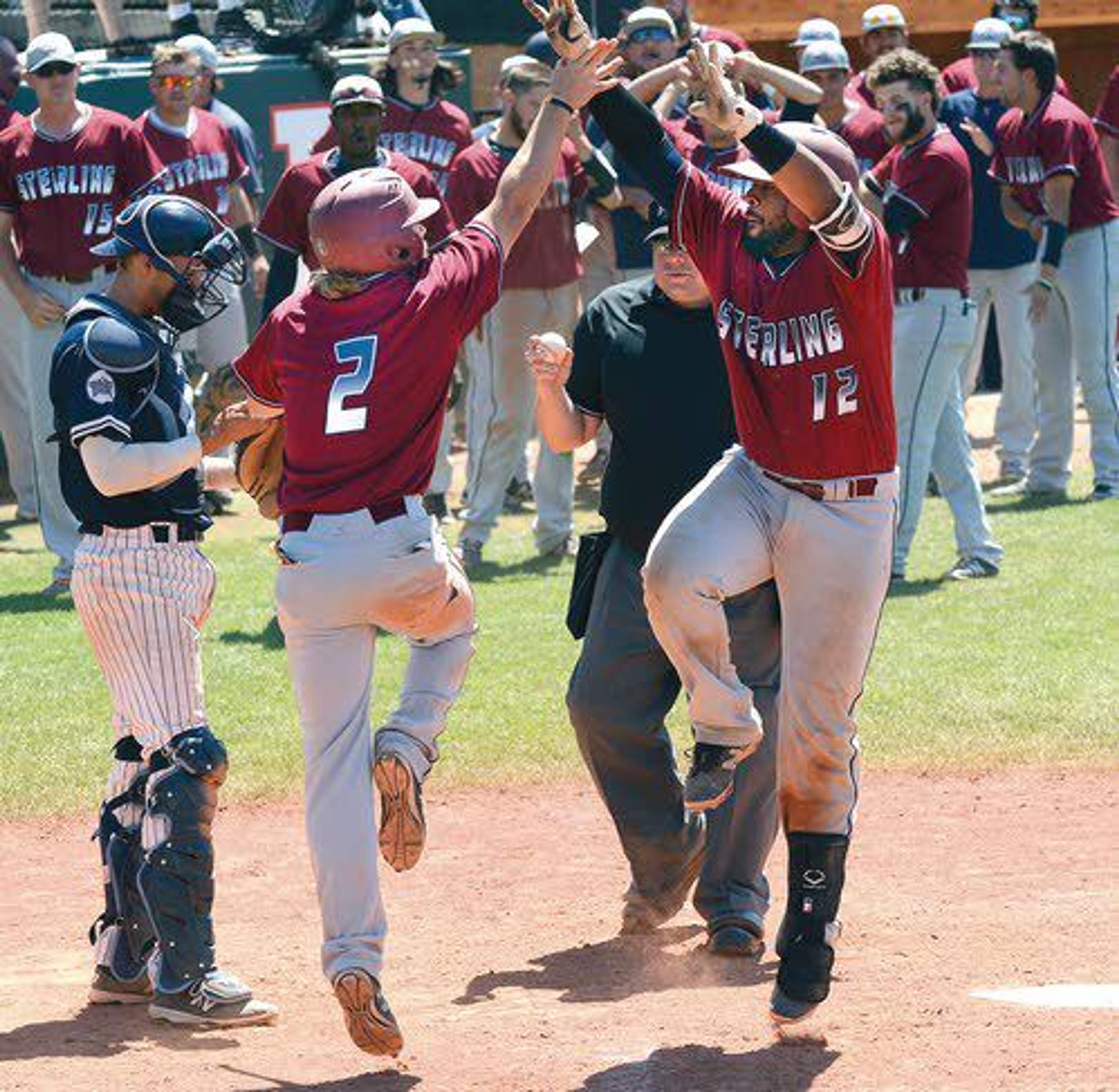 TOP PHOTO: Sterling’s Gerald Ceballos pounds a pitch from Master’s reliever Aaron Alexander. The ball sailed over the left-field wall for a two-run homer in the top of the ninth inning, giving the Warriors a 9-7 lead that would stand up as the final score. BOTTOM PHOTO: Ceballos is greeted exhuberantly by Jake Schimenz at home plate after the dinger.Tribune/Steve Hanks