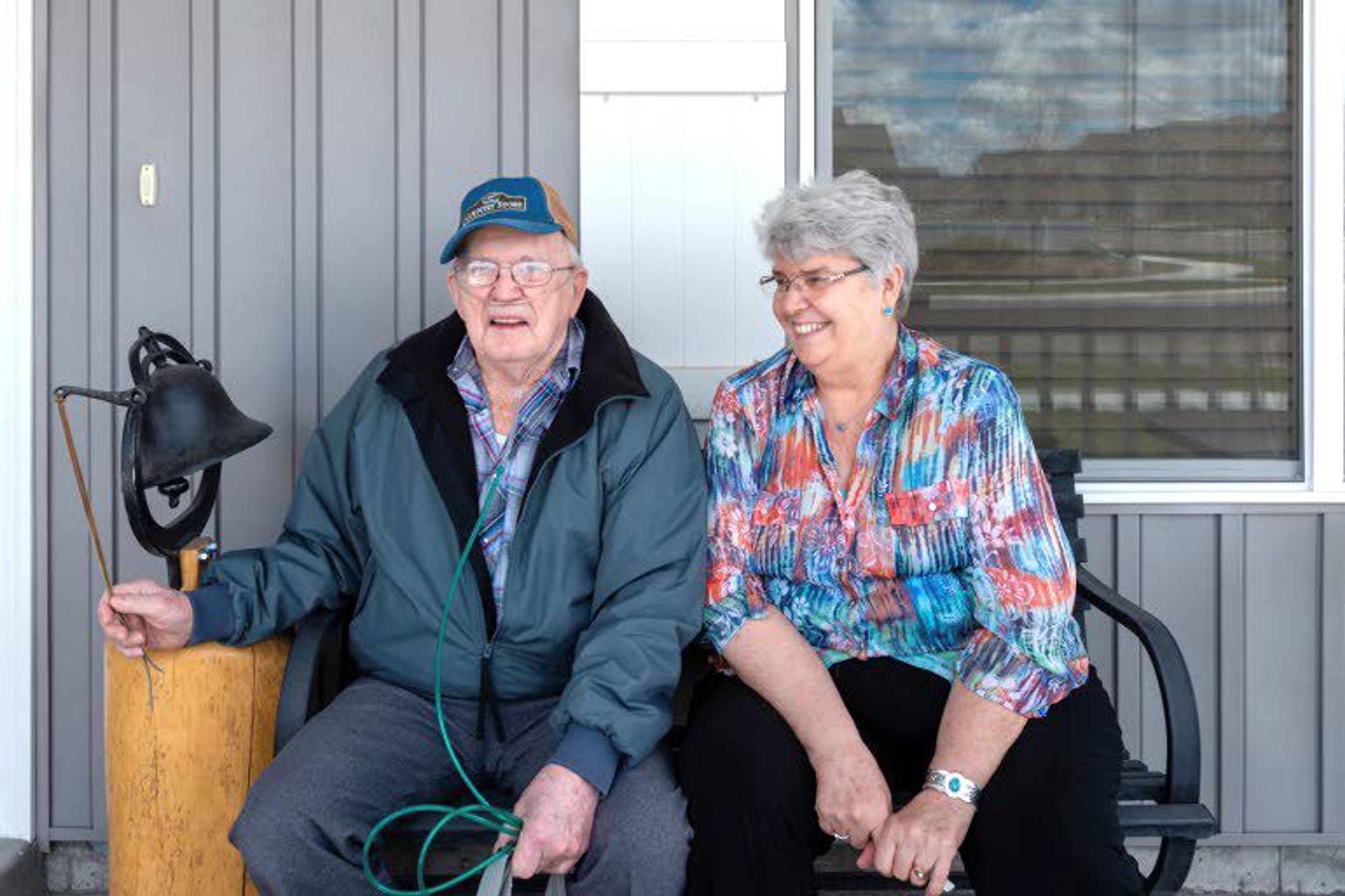 Delmar Scroughams and his wife, Vergie “Verg” Scroughams, are shown at home in Rexburg, Idaho. During a lucid moment in May, Delmar, who has dementia, acknowledged his weapons could prove dangerous.