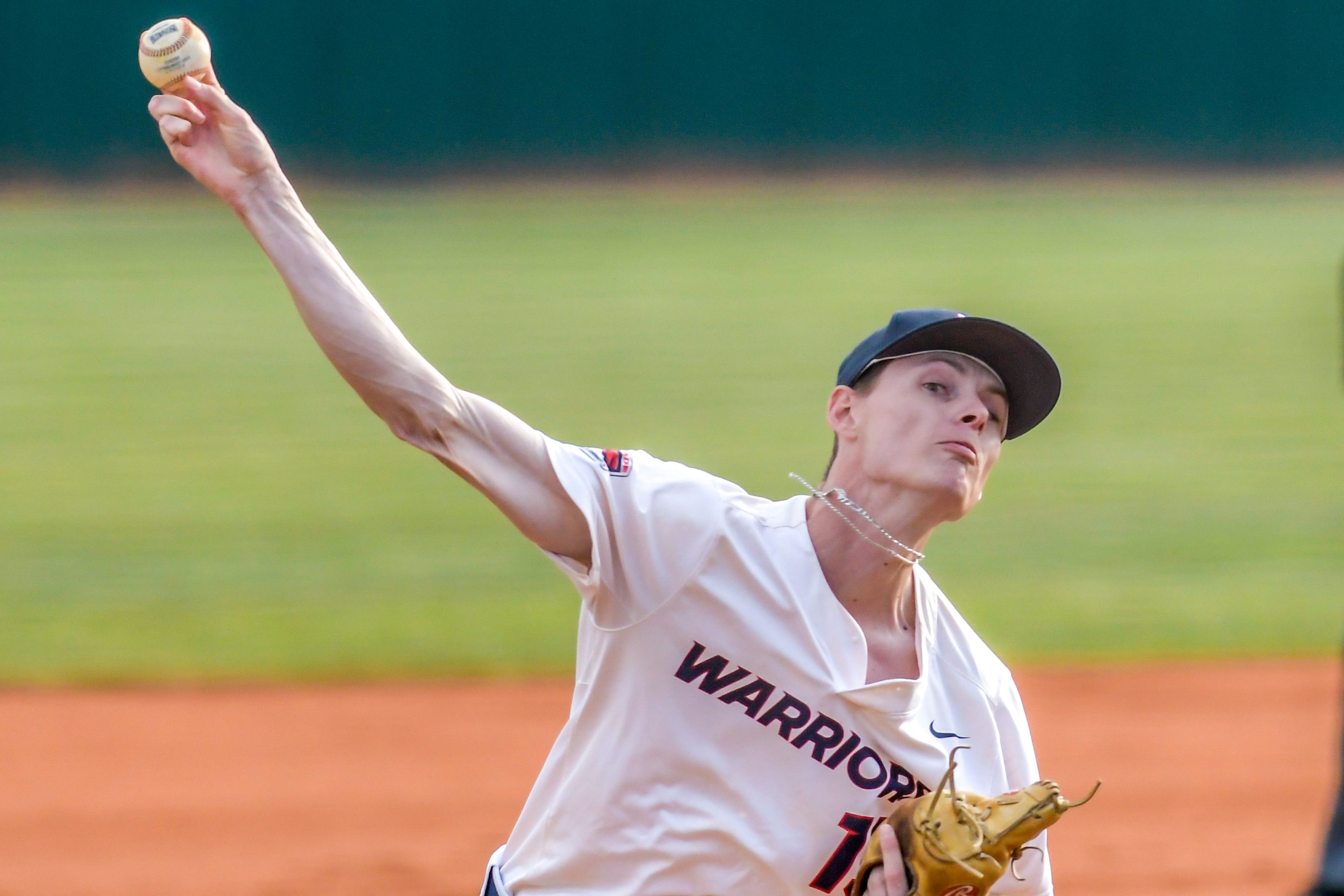 Lewis-Clark State pitcher Shane Spencer throws a pitch against UBC in an inning of a first round game of the NAIA Opening Round Monday at Harris Field in Lewiston.