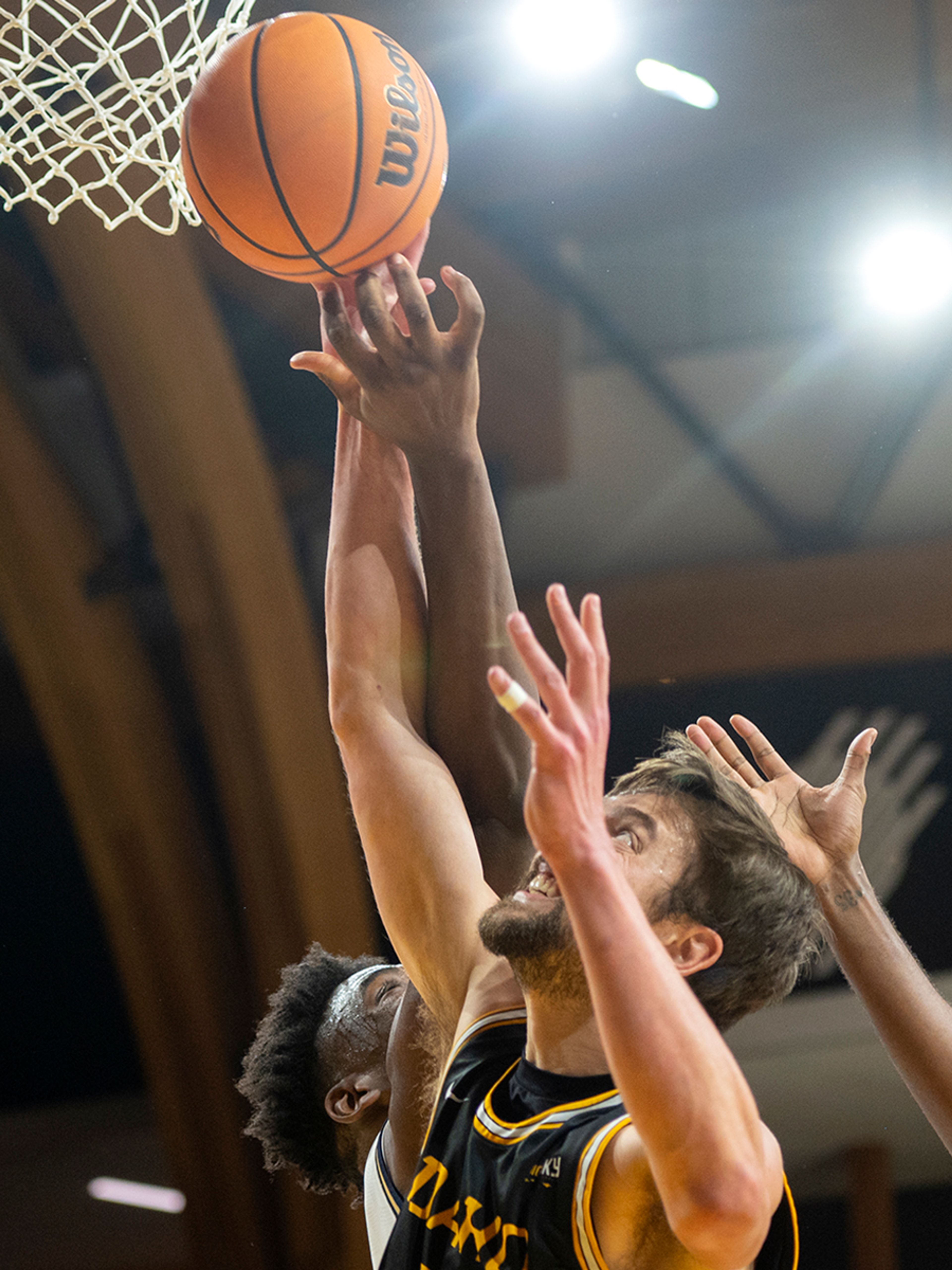 Idaho forward Michael Hanshaw, right, fights for a rebound against Montana State forward Great Osobor during the second half of Monday’s Big Sky Conference game at Idaho Central Credit Union Arena.