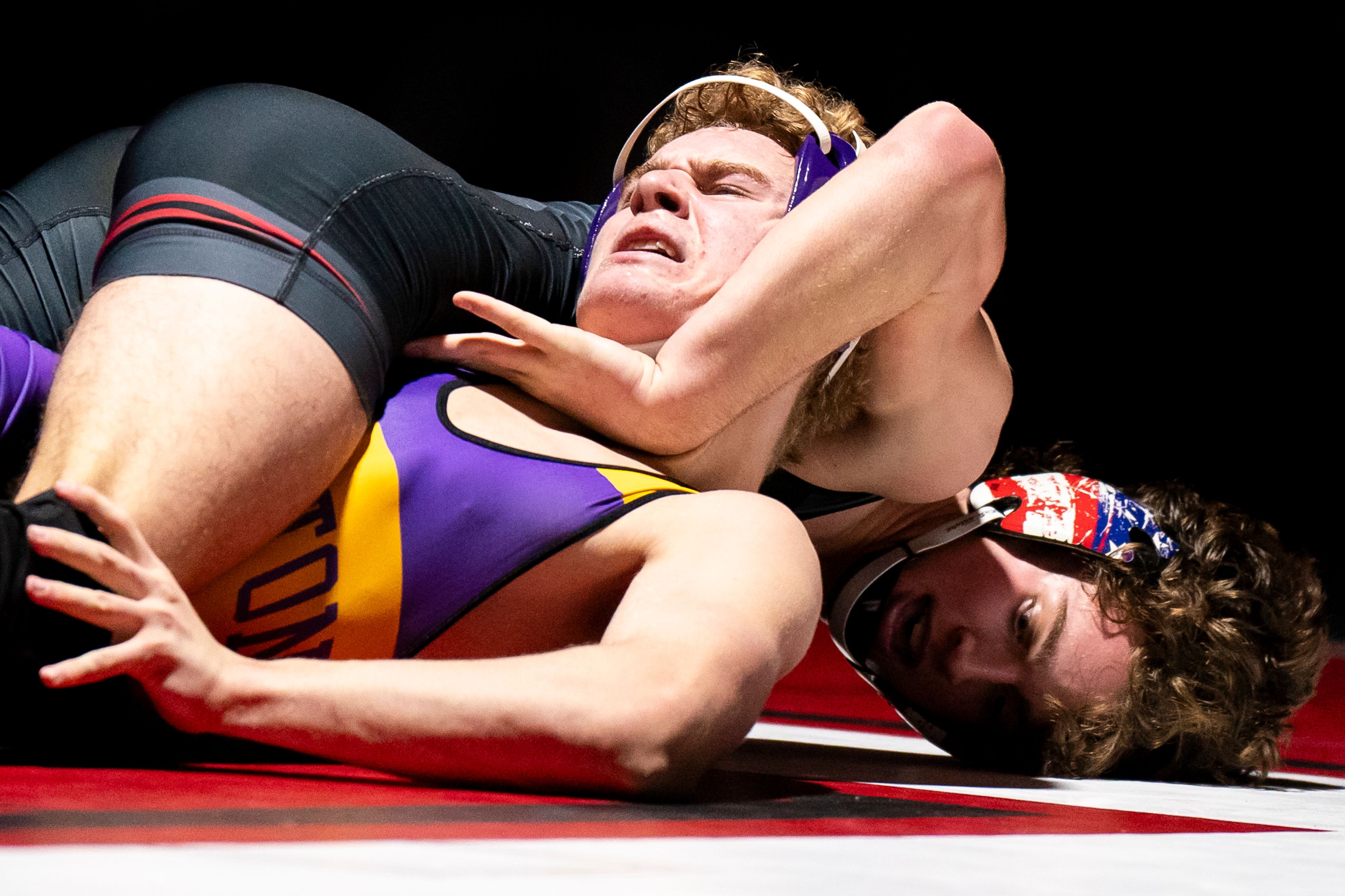 Clarkston’s Bodee Thivierge, right, attempts to pin Lewiston’s Mason Faling during a 144-pound match Wednesday at Kramer Gym in Clarkston.