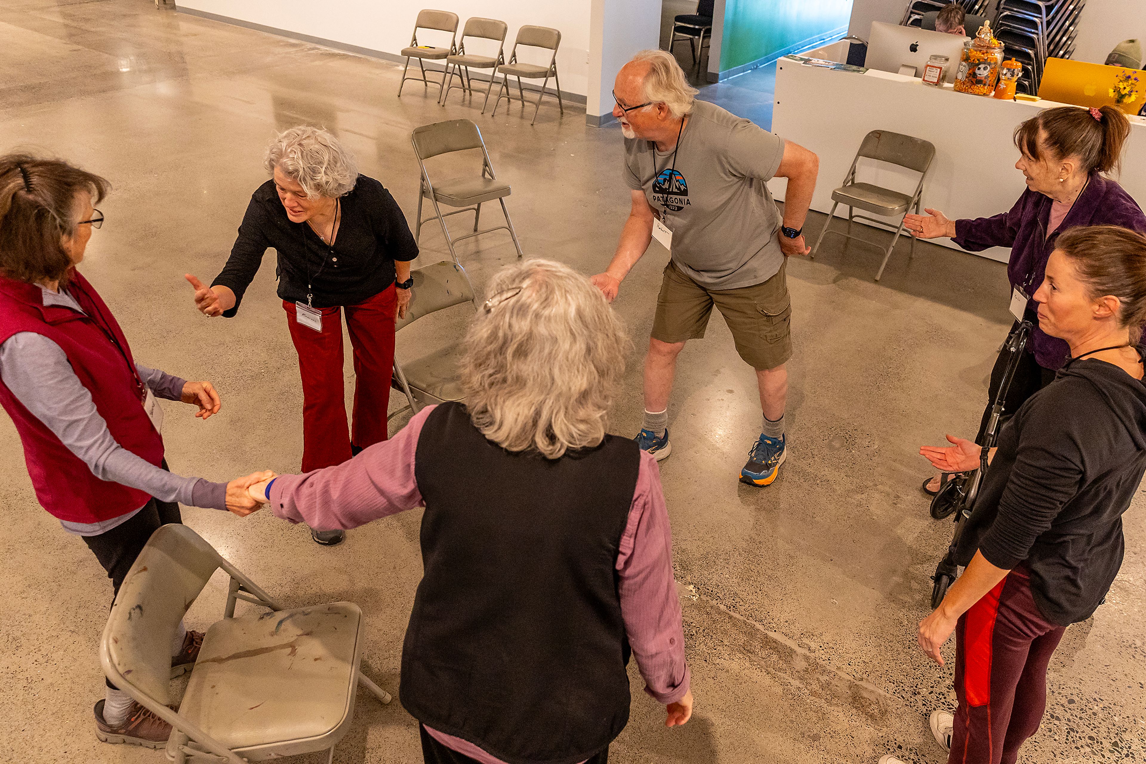 Members of a Dance for Parkinson's class bow to each other going around the circle Tuesday at Moscow Contemporary. ,