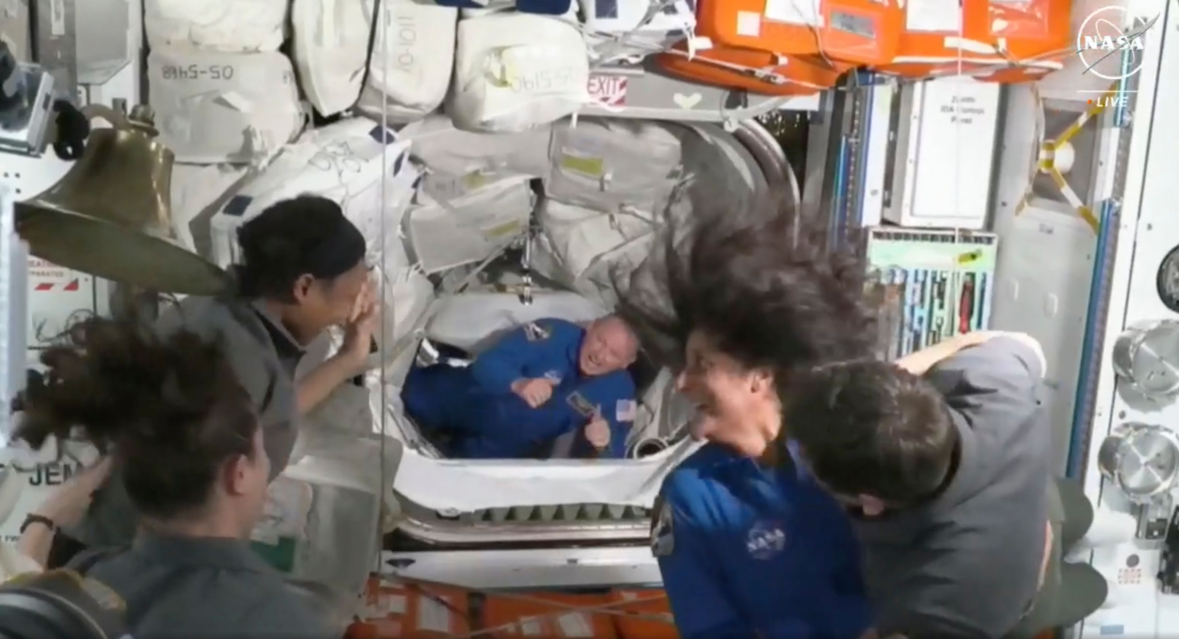 NASA astronauts Butch Wilmore and Suni Williams are greeted by the crew of the International Space Station on Thursday, June 6, 2024.