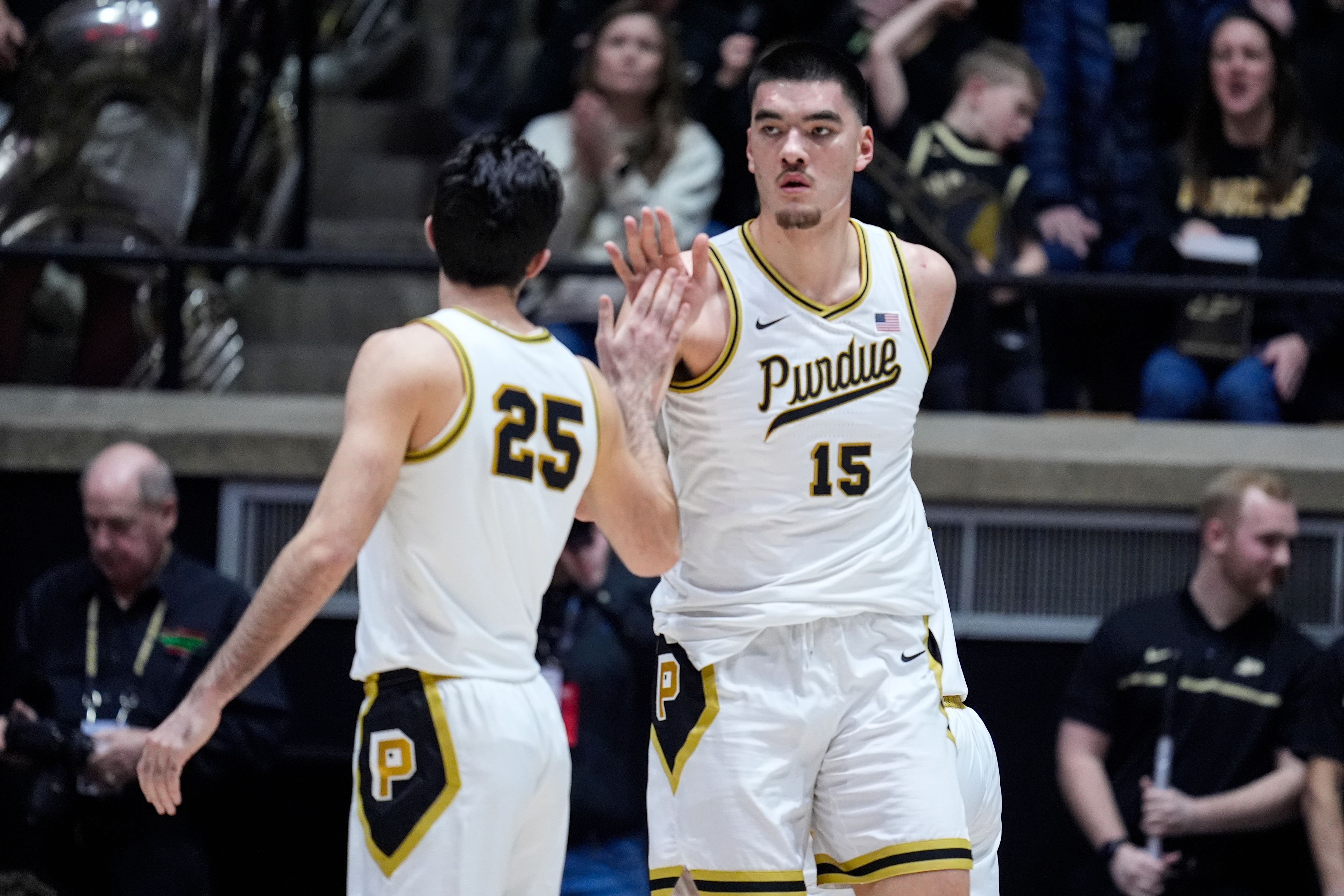 Purdue center Zach Edey (15) celebrates with guard Ethan Morton (25) after being fouled during the first half of an NCAA college basketball game against Penn State in West Lafayette, Ind., Saturday, Jan. 13, 2024. (AP Photo/Michael Conroy)