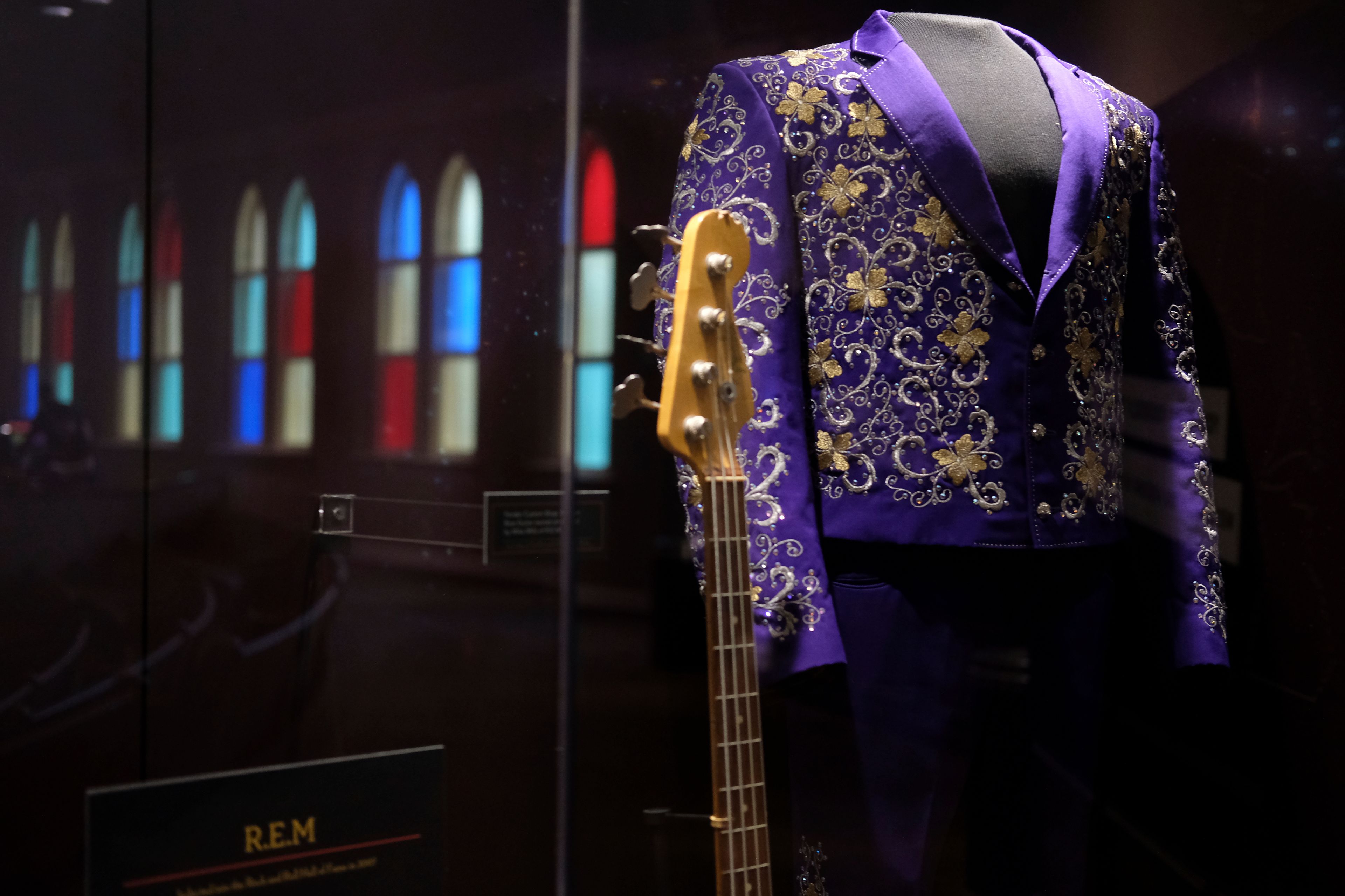 Instruments and clothing worn by artists are displayed at the Ryman Auditorium in Nashville, Tenn., on July 30, 2024.