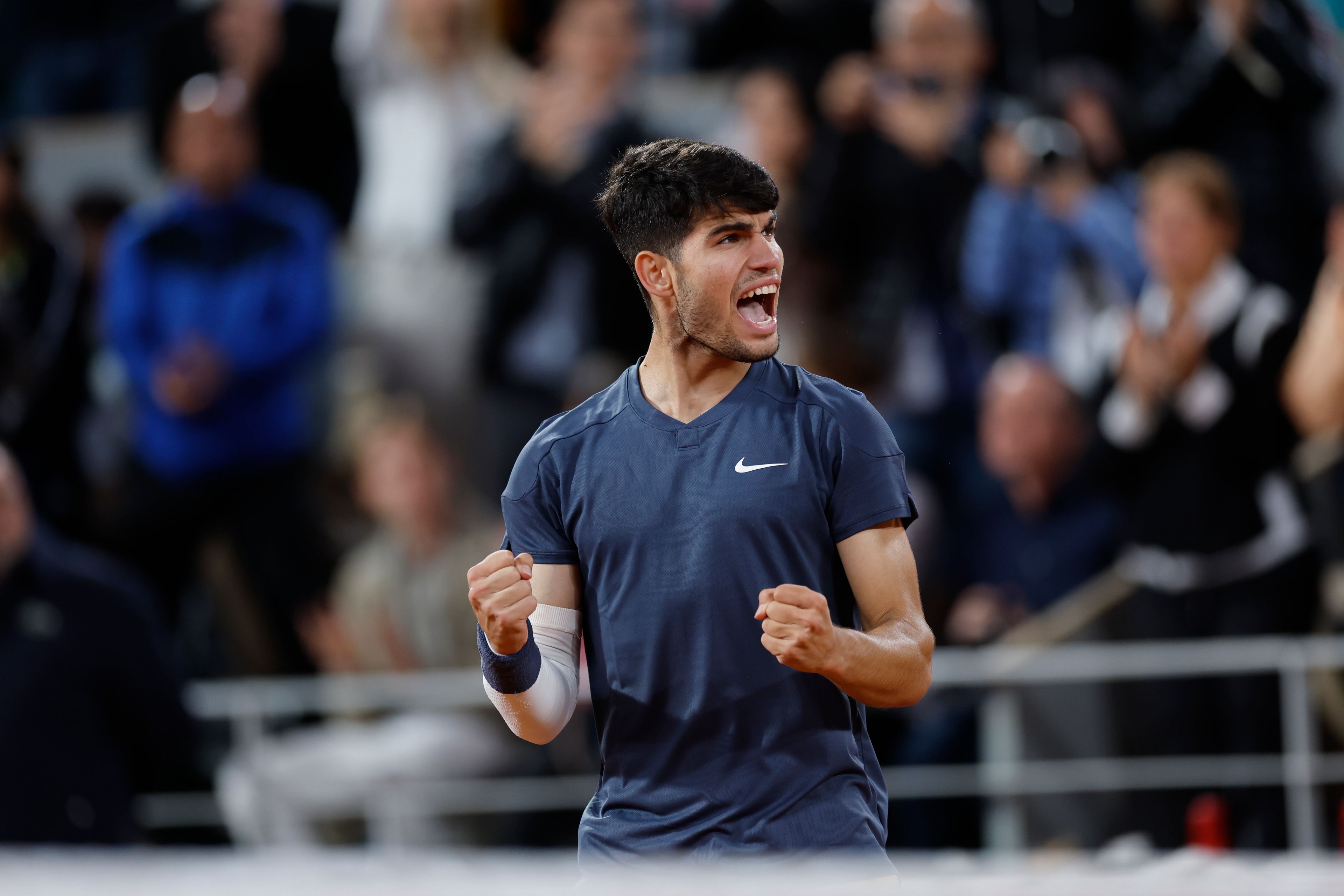 Spain's Carlos Alcaraz celebrates winning his second round match of the French Open tennis tournament against Netherlands' Jesper de Jong at the Roland Garros stadium in Paris, Wednesday, May 29, 2024.