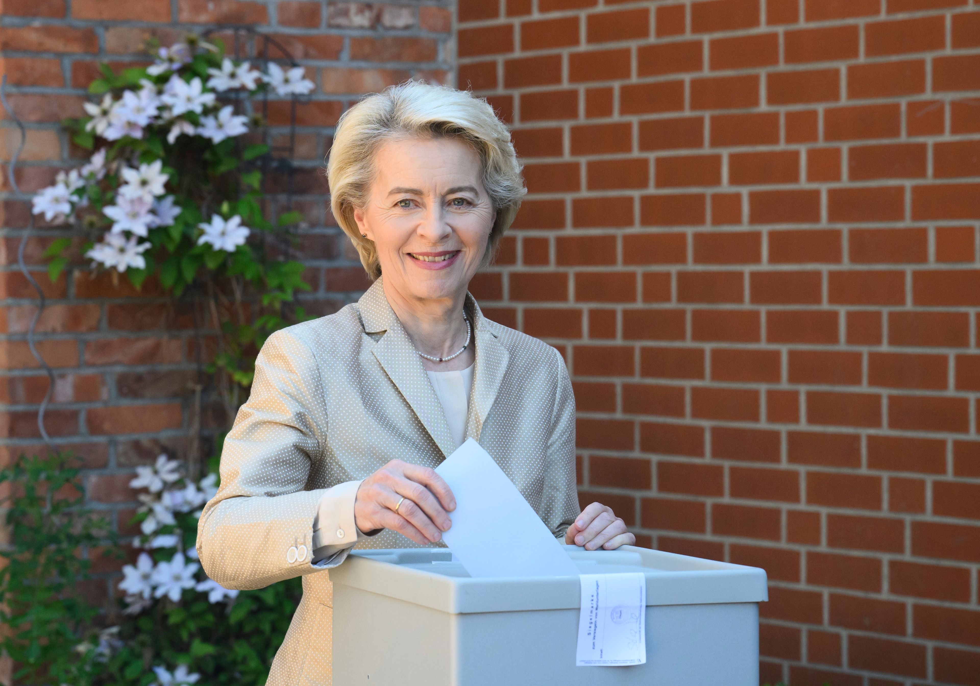 Ursula von der Leyen, President of the European Commission, casts her ballot for the European elections in a ballot box outside a polling station in the Hanover region in Burgdorf, Germany, Sunday, June 9, 2024. The European elections began on June 6 and voting in Germany will take place on June 9.