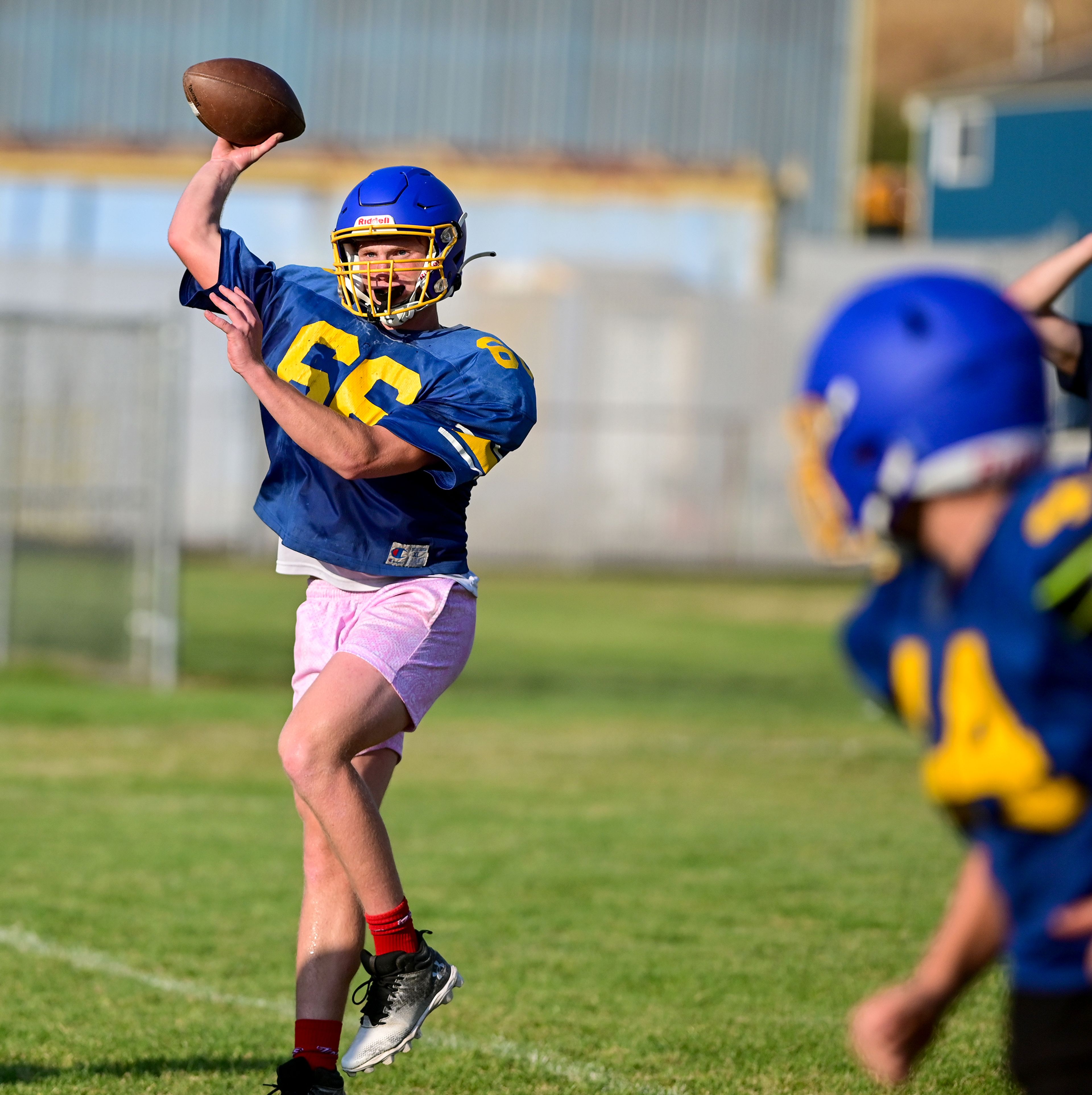 Colfax sophomore quarterback Ryker Reed prepares a throw at practice on Tuesday.