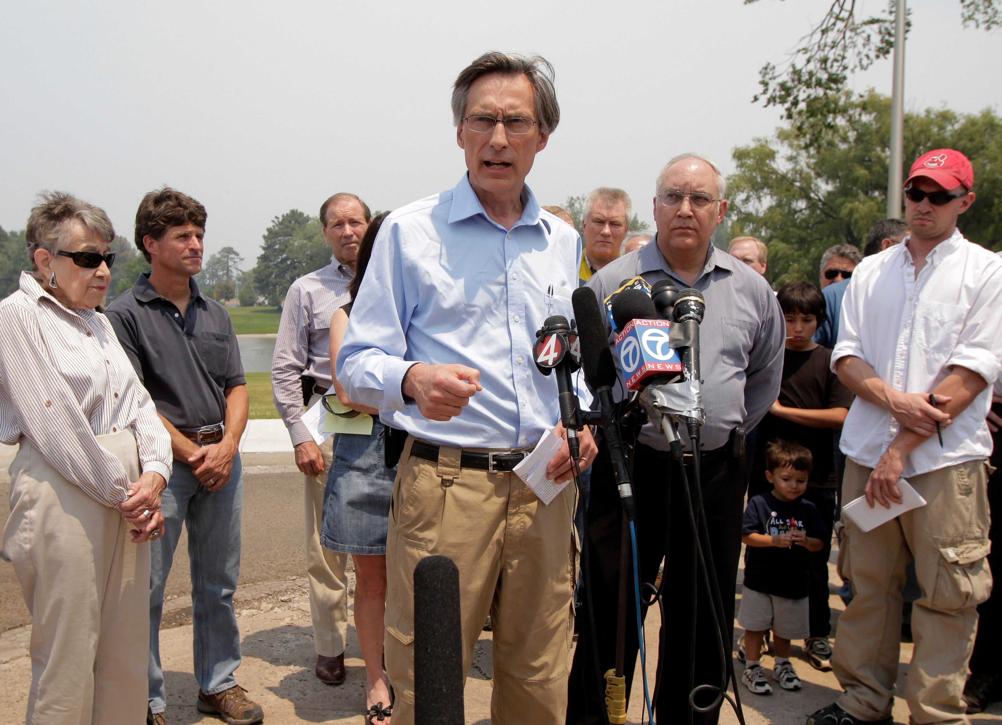 FILE - Charles McMillan, center, director of Los Alamos Laboratory, talks to reporters during a news conference in Los Alamos, N.M., June 28, 2011.