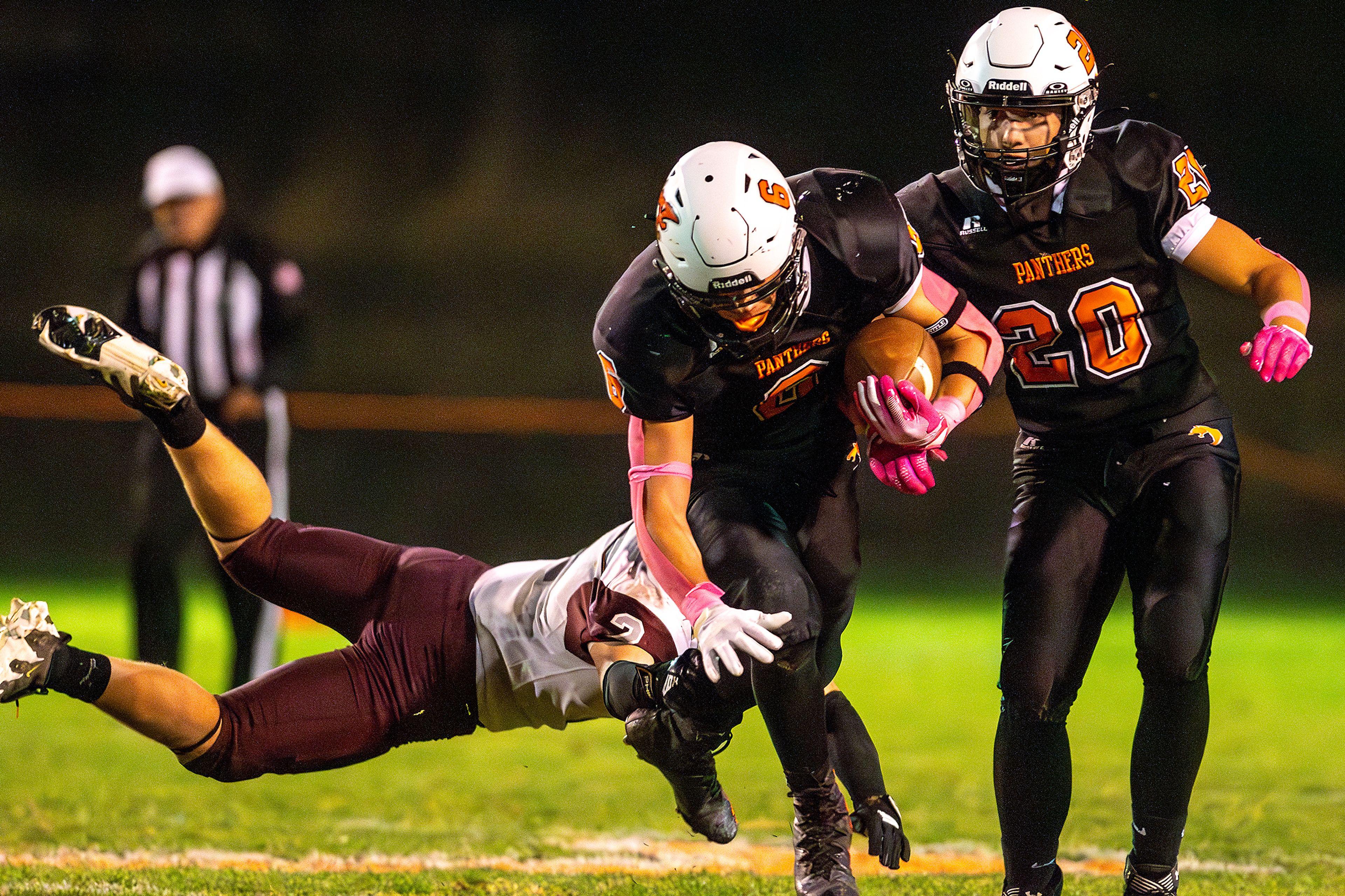 Asotin running back Peter Eggleston avoids a tackle from Reardan as he runs the ball during a Northeast 2B League game Friday in Asotin.,