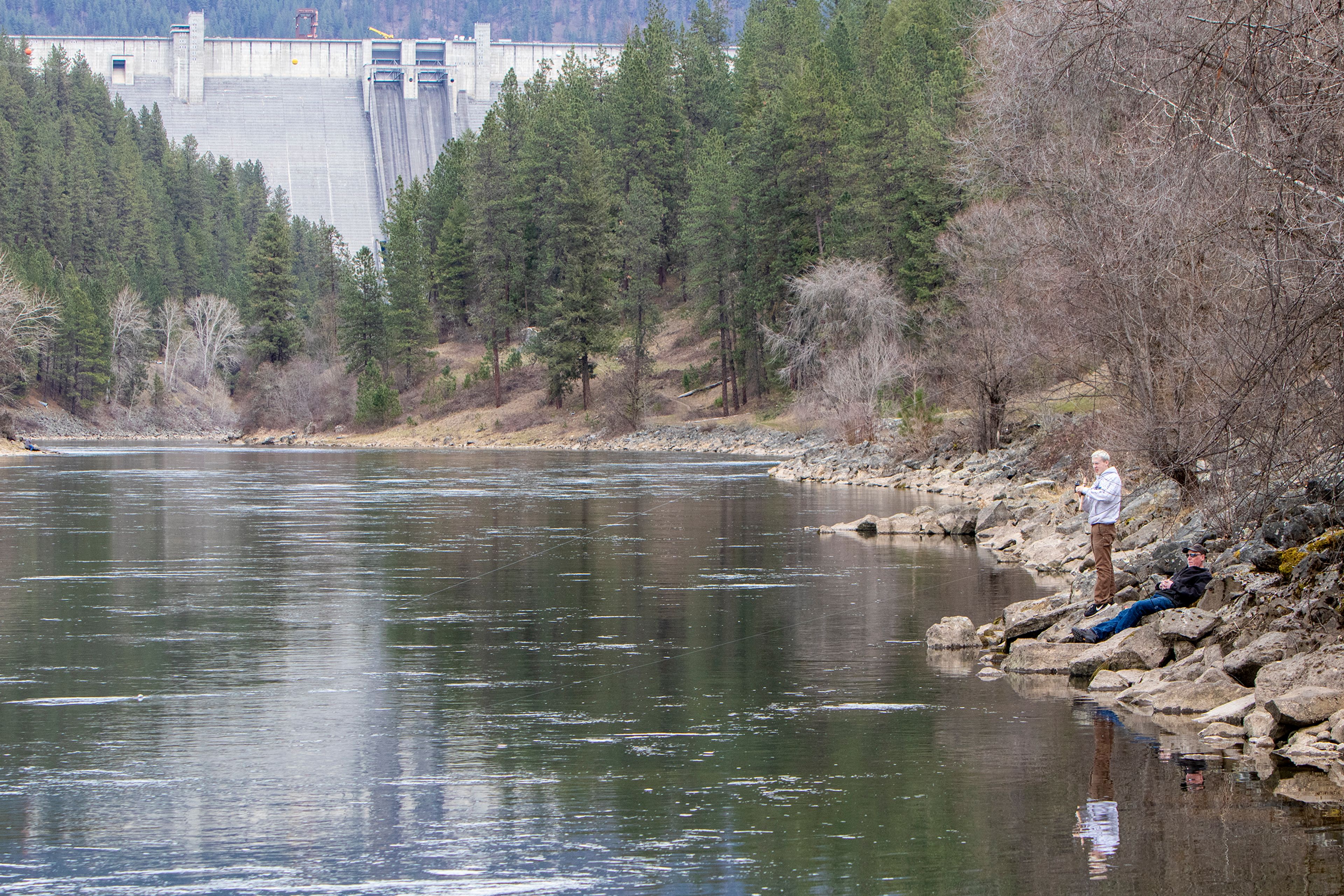 Christ Hunt, right, and his son Jamison, of Orofino, enjoy an afternoon fishing on the Clearwater River near Dworshak Dam in March.