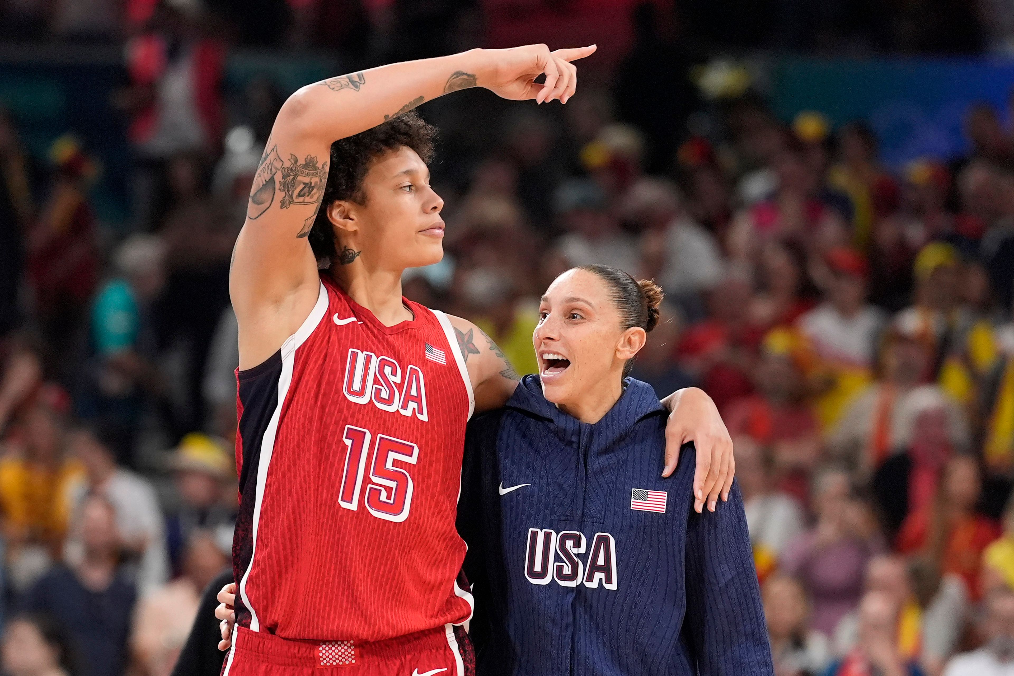 United States' Brittney Griner, left, and United States' Diana Taurasi walk off the court after the United States defeated Belgium in a women's basketball game at the 2024 Summer Olympics, Thursday, Aug. 1, 2024, in Villeneuve-d'Ascq, France. (AP Photo/Michael Conroy)