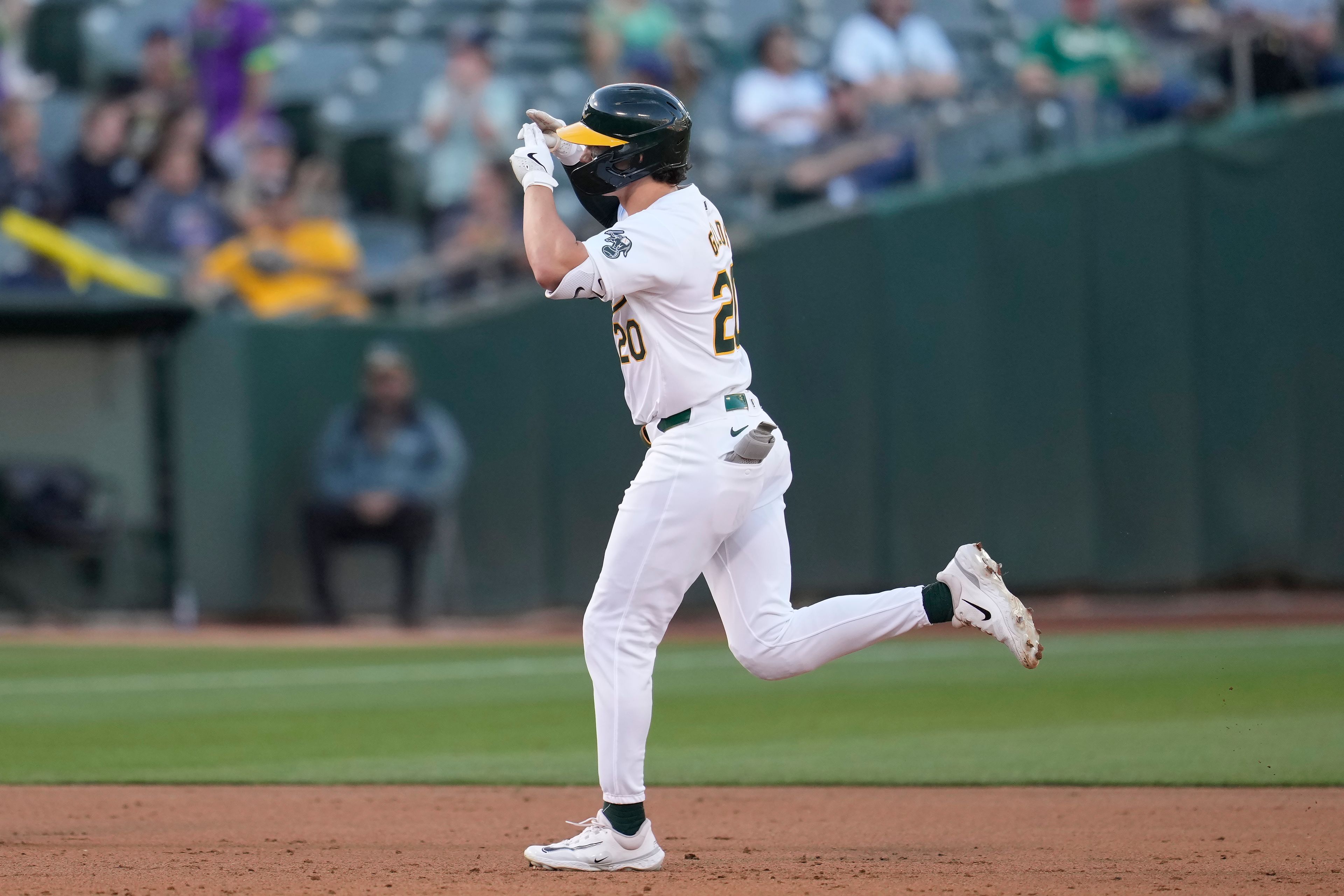 Oakland Athletics' Zack Gelof gestures after hitting a home run against the Seattle Mariners during the third inning of a baseball game in Oakland, Calif., Wednesday, June 5, 2024. (AP Photo/Jeff Chiu)