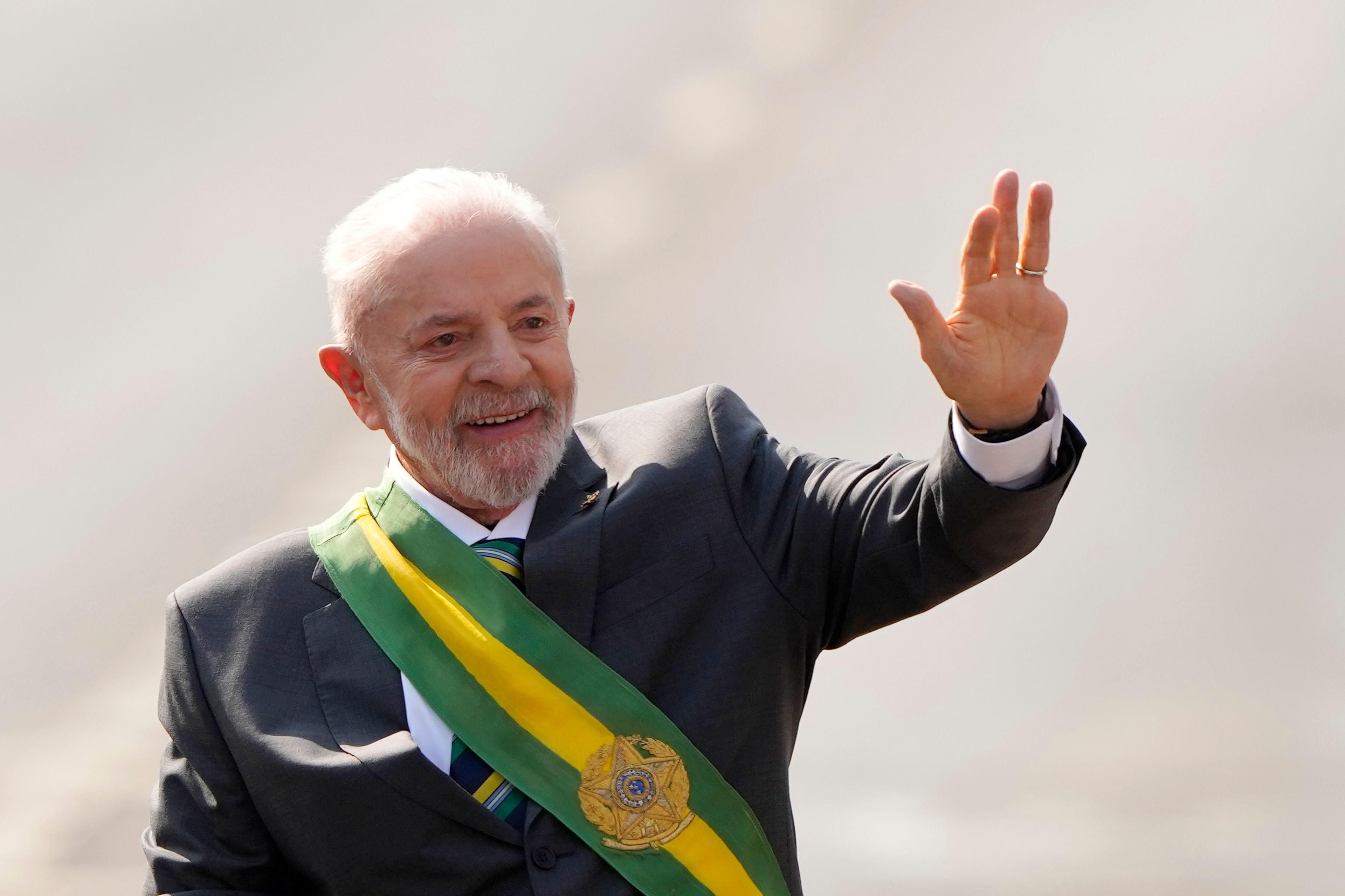 Brazilian President Luiz Inacio Lula da Silva wave at the start of the military parade on Independence Day, in Brasilia, Brazil, Saturday, Sept. 7, 2024.