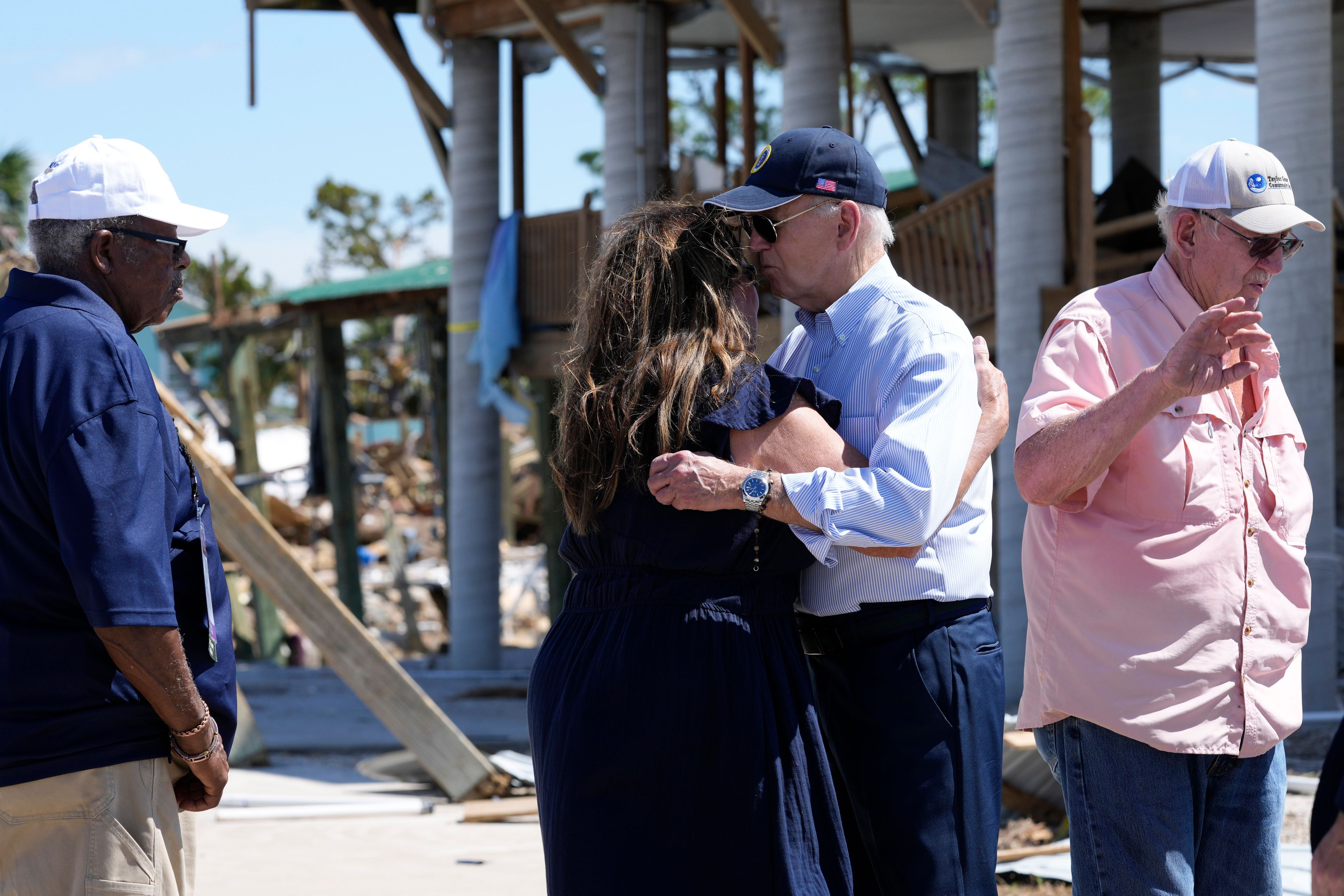 President Joe Biden greets people in Keaton Beach, Fla., Thursday, Oct. 3, 2024, during his tour of areas impacted by Hurricane Helene. (AP Photo/Susan Walsh)