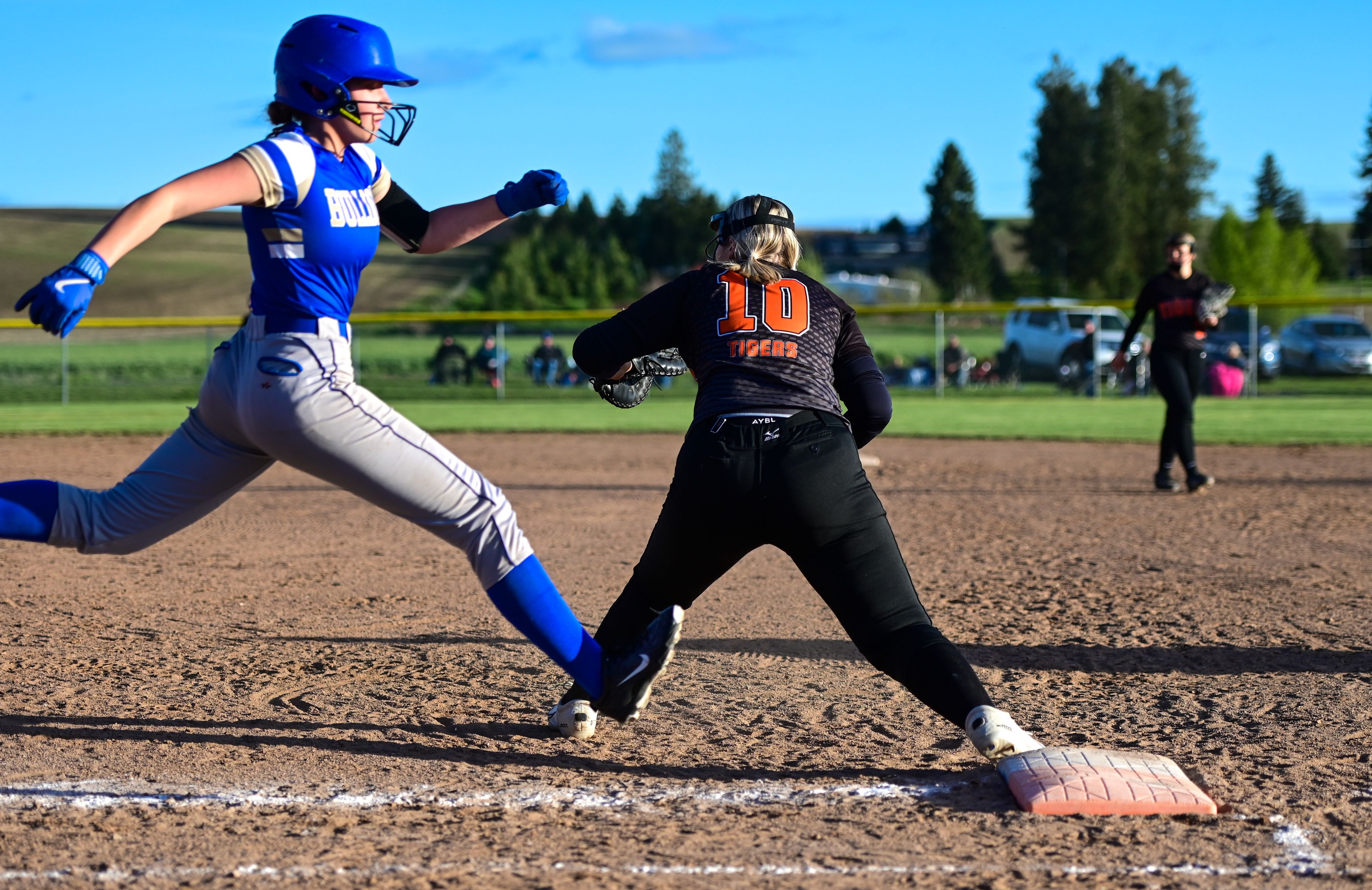 Kendrick’s Taylor Boyer catches the ball before Genesee’s Mia Scharnhorst can reach first base during an Idaho 2A district tournament championship game Wednesday in Genesee.