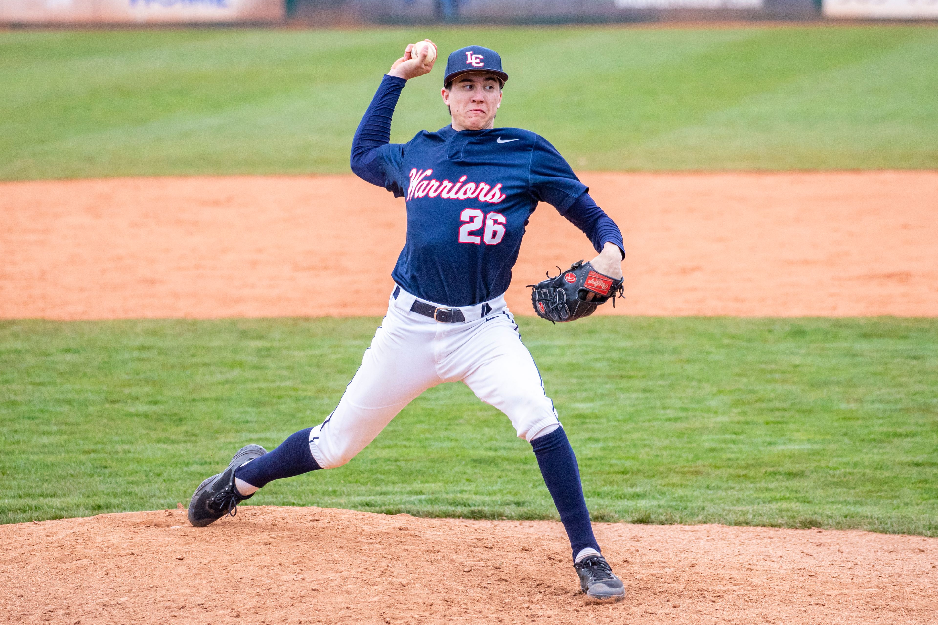 Lewis-Clark State pitcher Drake George throws during an April 16 Cascade Conference game against College of Idaho. The Warriors will play defending national champion Southeastern (Fla.) on Feb. 13.