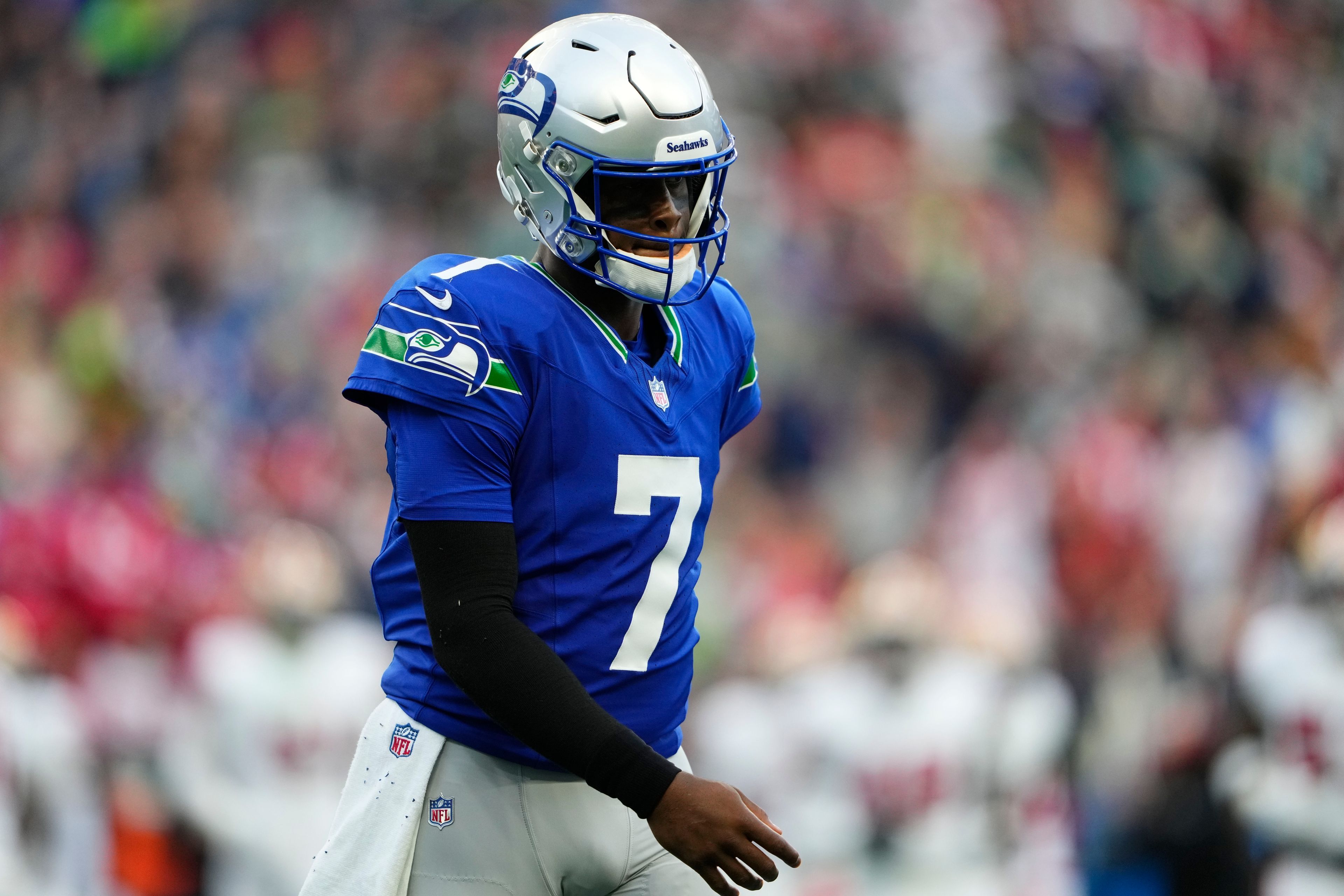 Seattle Seahawks quarterback Geno Smith walks off the field during the first half of an NFL football game against the San Francisco 49ers, Thursday, Oct. 10, 2024, in Seattle. (AP Photo/Lindsey Wasson)