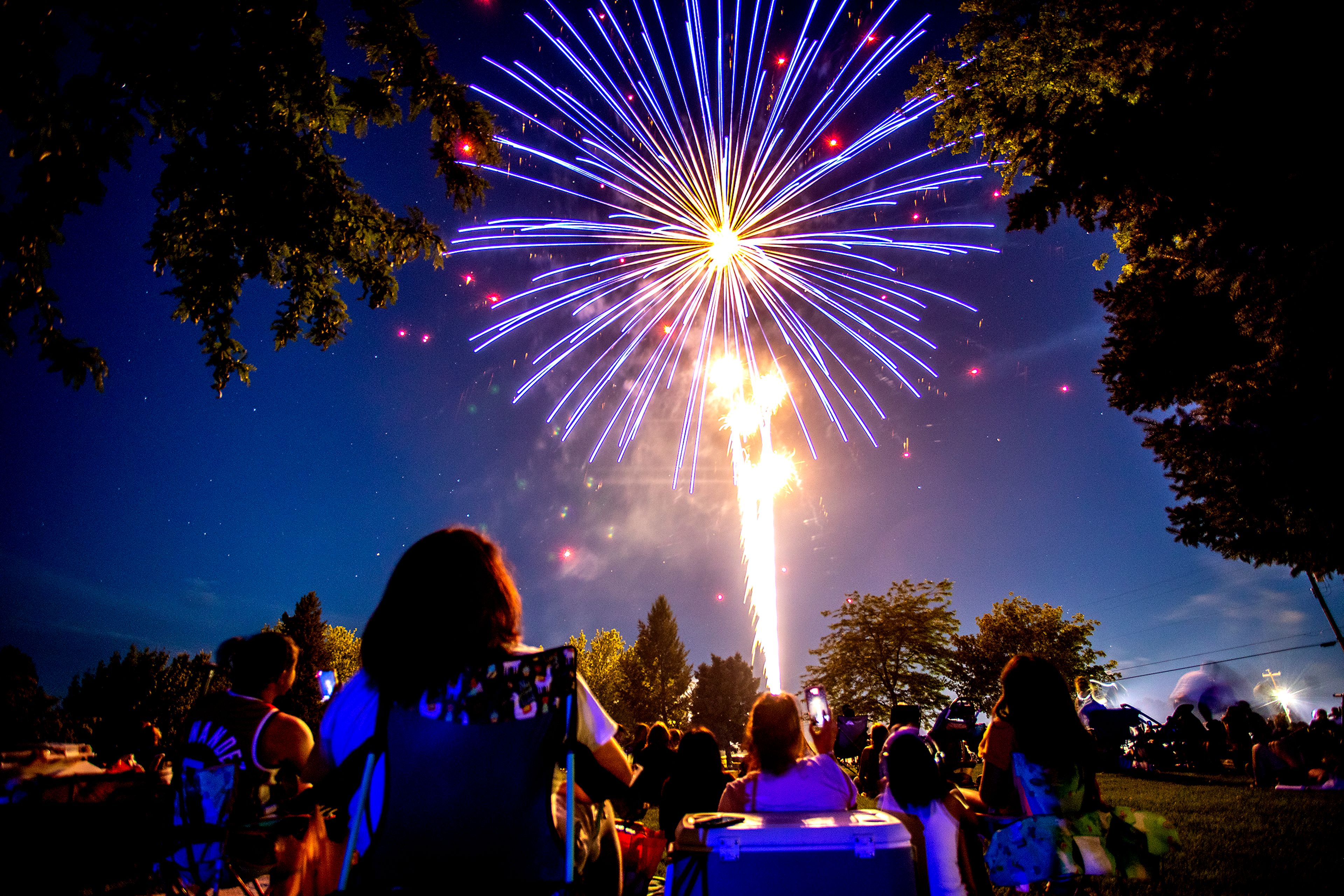 People watch the Community Spirit Fireworks Show over Beachview Park in Clarkston on Sunday.