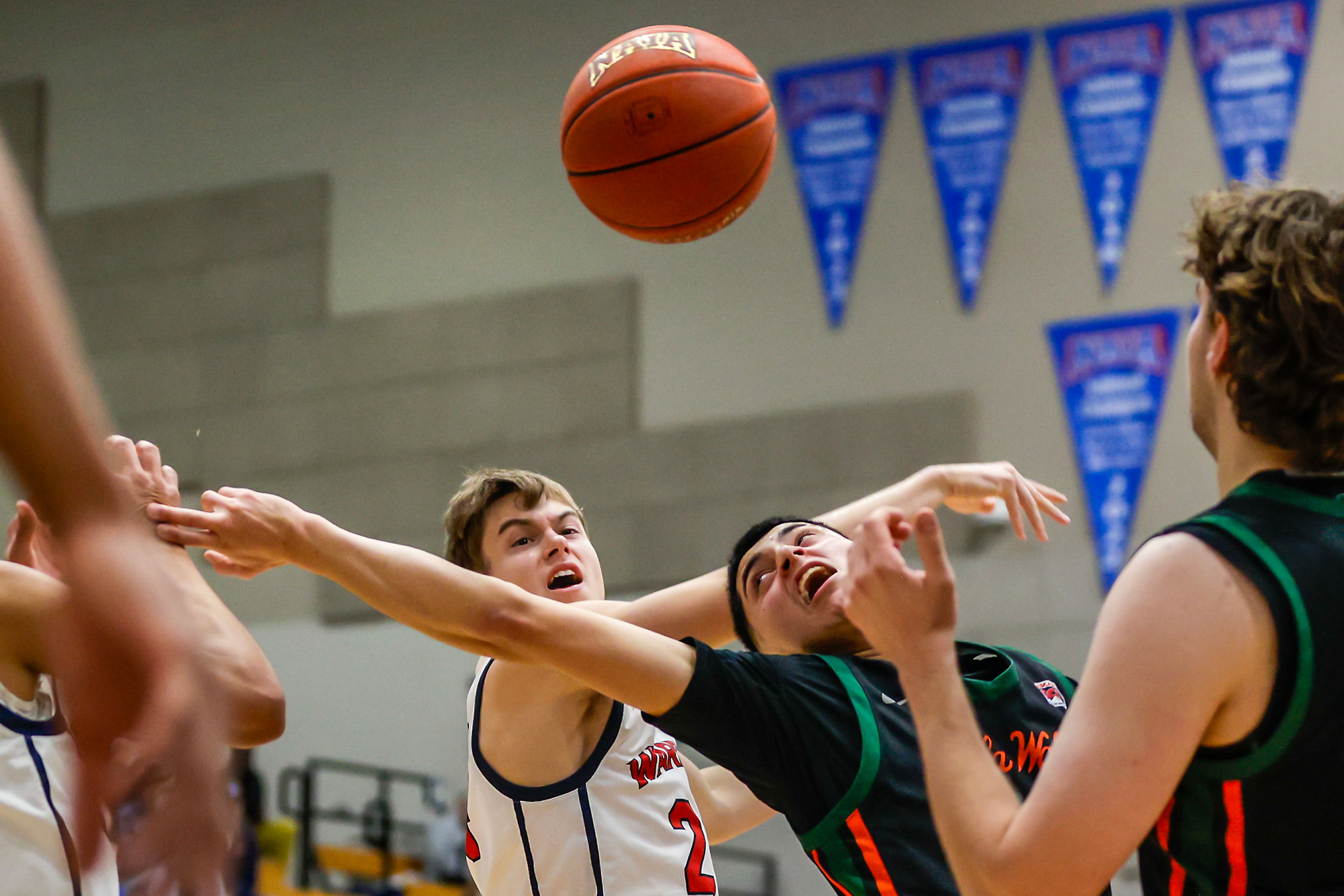 Lewis-Clark State guard Peyton Nordland competes for the rebound with Walla Walla guard Josue Mireles during a quarter of a Cascade Conference game Tuesday at Lewis-Clark State College in Lewiston.