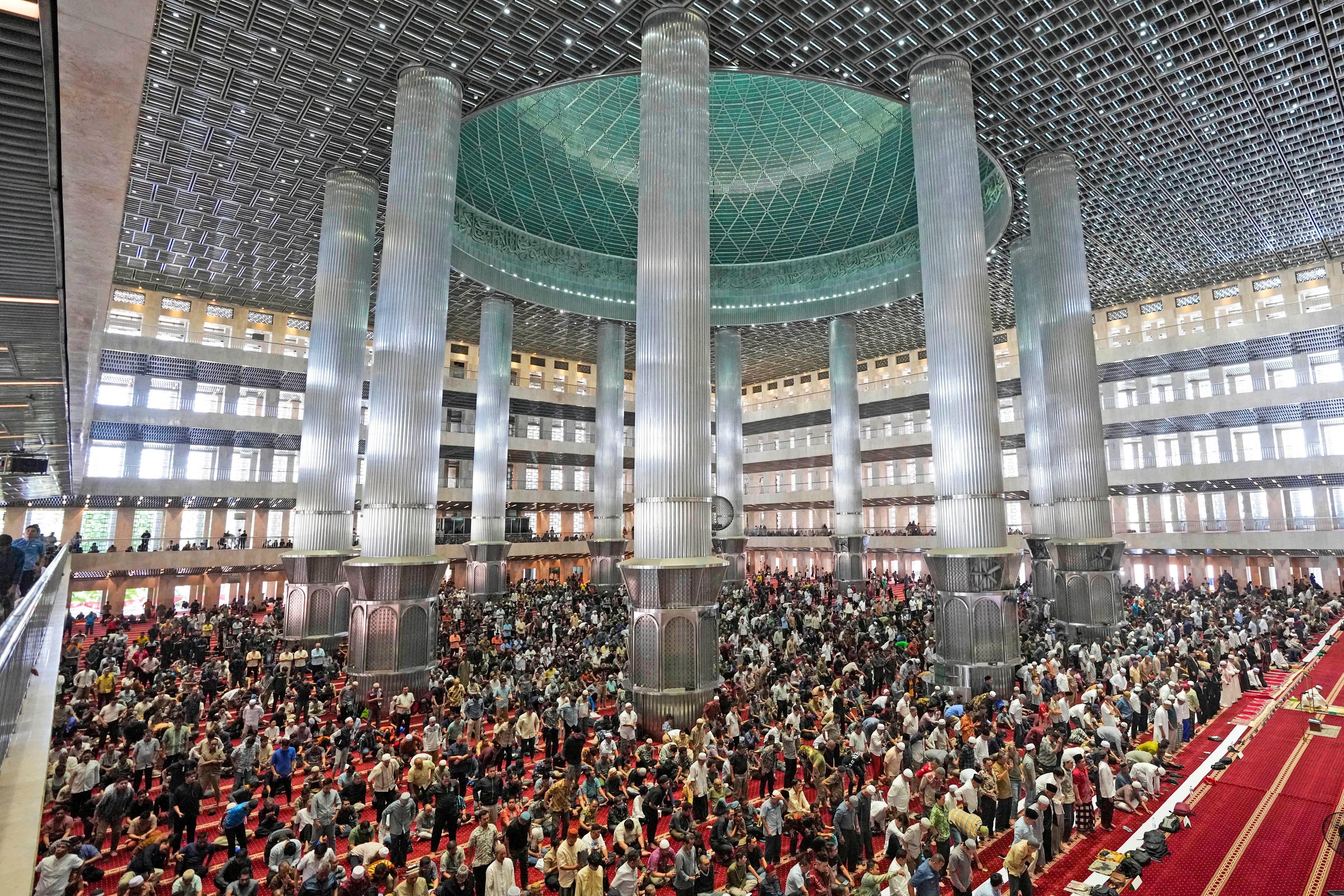 Muslim men attend Friday prayer at Istiqlal Mosque in Jakarta, Indonesia, Friday, Aug. 9, 2024, where Pope Francis is scheduled to hold an interfaith meeting on Sept. 5.